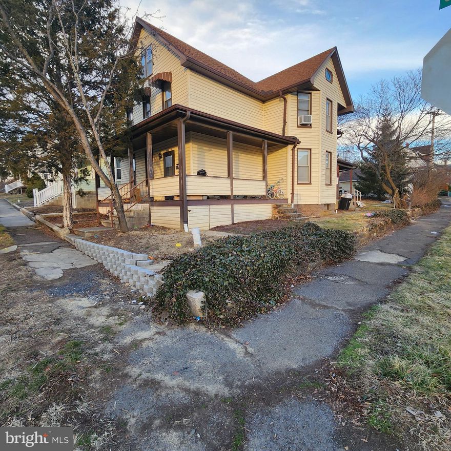 Large home in South End of city. Close proximity to schools, local library and conveniences. Home boasts large rooms w/main level bedroom or family room. Freshly painted, new laminate plank flooring, main level bath updated, and other upgrades. Fenced rear yard could become off-street parking from alley. Corner lot has had some improvements as well. With a little more love, this older home would be stunning. Gotta see to appreciate.