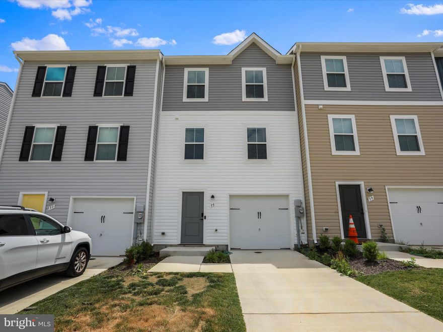 WELCOME HOME to this like new, less than one year old and barely lived in, spacious 3 level, 3 bedroom/2 full bathroom/1 half bathroom townhome in sought after Dillon Farm community just minutes from the Maryland and Virginia state lines. Townhomes in Dillon Farm are almost SOLD OUT, here is your opportunity to move right in without the new construction wait. Tasteful colors, luxury vinyl plank flooring, and three finished floors of comfortable living space.  Stunning gourmet kitchen has an impressive island large enough to accommodate up to 4 breakfast stools, plus lots of cabinet and workable counter space, stainless steel appliances and large pantry. Dining area is large enough to accommodate all your dining room furniture pieces. There is also a half bathroom conveniently located off the kitchen so there will be no need to go up or down stairs while cooking or while relaxing and watching TV in the living room. Ceiling lights in every bedroom are pre-wired for a ceiling fan. Primary bedroom has a huge walk-in closet and a private bathroom with huge walk-in, ceramic tiled shower. Lower walk-out level can be used as a family room/game room/exercise room/hobby room. The possibilities are endless. It could be used as a whole other living space! Very commuter friendly location within just minutes to I-81 and the Virginia state line, and just 20 minutes to the MD state line. Close proximity to shopping, grocery stores, and restaurants. Eligible for USDA and WVHDF. With these programs you could purchase with little or no money out of pocket! Don't miss your opportunity. Schedule your showing today before it's gone!