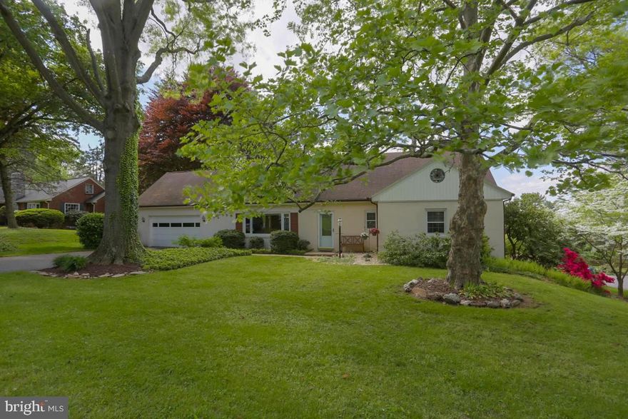 Desirable location with this 4 bedroom cape cod in Manheim Township's Blossom Hill with spacious living space. Lots of hardwood flooring, tons of storage including a walk in cedar closet and finished walk out lower level with workshop area. Bedroom suite with full bath on first floor, kitchen with breakfast bar, living room with wood burning fireplace and rear patio leads to spacious backyard with mature landscaping and shed.