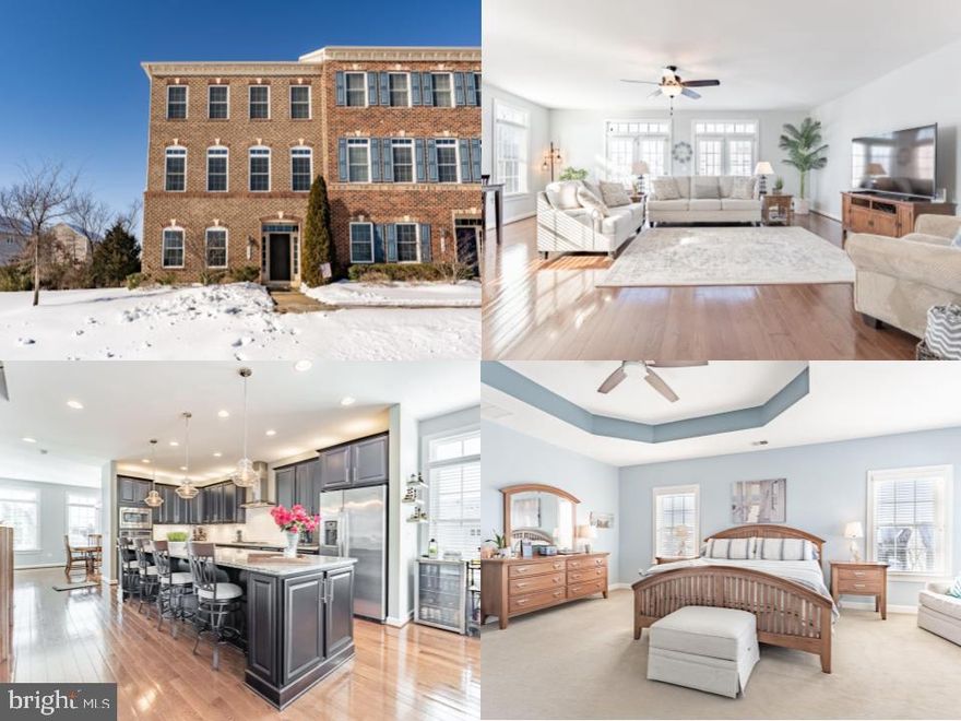 *Open Houses: 5-7 PM Friday, February 6 | 1-3 PM Saturday, February 7 | 1-4 PM Sunday, February 8.*
A Perfect 10! Experience refined living in the heart of the highly coveted Wentworth Green community with this pristine, luxury brick end-unit NVHomes Andrew Carnegie model featuring the rare 10’ extension and three fully finished levels. Offering 3 spacious bedrooms, 3.5 baths, and an attached 2-car garage, this meticulously maintained home radiates pride of ownership throughout. Step inside to find fresh, neutral paint and a bright, open layout. The entry level offers a versatile family room, a full bathroom, and a large storage area—perfect for guests, a home office, or additional living space. The main living level boasts 9-foot ceilings and a modern open-concept design with premium trim work, a sun-filled formal dining room with walls of windows, a spacious family room, and a powder room. The gourmet kitchen is a true showstopper, featuring a massive 12-foot island, stylish tile backsplash, stainless steel appliances, wall oven, under-cabinet and above-cabinet lighting, dimmable recessed lighting, pendant lights, and a large walk-in pantry. The family room opens directly to the maintenance-free composite deck, making it perfect for entertaining or relaxing.The upper level features three generously sized bedrooms, a laundry room, a hall bath with dual sinks, and a linen closet. The luxurious primary suite impresses with upgraded plush carpet, tray ceiling,   two large walk-in closet, and a spa-like en-suite bath with dual granite vanities and a frameless glass walk-in shower.As an end unit, this home enjoys additional community green space and professional landscaping. Wentworth Green offers outstanding amenities including a clubhouse, pool, basketball and tennis courts, walking trails, dog park, playgrounds/tot lots, and community events. The location is unbeatable—walk or bike to Virginia Gateway / Promenade Town Center, Conway Robinson Park, Regal Cinemas, restaurants, shopping, and Life Time Fitness, with easy access to Route 29 and I-66 for commuting. Even better, Gainesville Middle School and Gainesville High School are within walking distance.This expansive townhome lives like a single-family home while offering low-maintenance convenience. This home truly has it all—schedule your showing today. It will not disappoint!