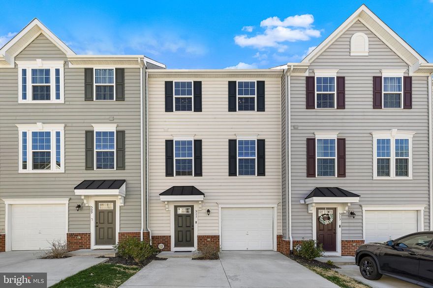 This charming Colonial townhouse, built in 2021, offers a perfect blend of modern comfort and inviting warmth. With 1,890 square feet of thoughtfully designed living space, this residence features three spacious bedrooms and two and a half bathrooms, ensuring ample room for relaxation and entertainment. Step inside to discover an open floor plan that seamlessly connects the living and dining areas, creating a welcoming atmosphere for gatherings. The heart of the home is the stunning kitchen, complete with a stylish island and equipped with stainless steel appliances, including a built-in microwave, dishwasher, and electric oven/range. Retreat to the luxurious master suite, featuring a walk-in closet and a spa-like bathroom with a soaking tub and a stall shower, perfect for unwinding after a long day. The additional bedrooms are generously sized, providing comfort and versatility for your lifestyle. Outside, enjoy the low-maintenance, level lot with a delightful deck, ideal for summer barbecues or morning coffee. The attached garage and concrete driveway offer convenient parking options. The community features fantastic amenities, including a clubhouse with pool, fitness center, and playgrounds. With included services like trash and snow removal, you can spend more time enjoying your new home and less time on chores. Don’t miss the opportunity to make this beautiful property your own—schedule a tour today and experience yourself!  This home does have a Veteran Assumable VA loan. Close to I-95 and downtown Fredericksburg shopping nearby.