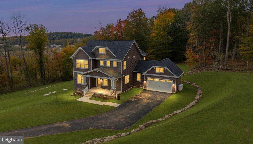 ***BRAND NEW MOVE IN READY HOME*** on a private 12+ acres homesite with panoramic views within the MIDDLETOWN SCHOOL DISTRICT.  Built by Laine Street Homes, this property is loaded with high end amenities including a true gourmet eat-in kitchen with high end cabinetry, large center island with breakfast bar, quartz countertops and slab backsplash and professional grade appliances including a 36” six burner range. Additional main level highlight include a separate office, formal dining room, mudroom with built-ins, and a spacious family room featuring large picture windows and a gas fireplace with custom quartz surround. On the upper level you will find the deluxe owner’s suite with a 6x7ft spa shower with dual shower heads and luxurious soaking tub. Rounding out the upper level are 2 additional bedrooms and a spacious multi-purpose loft. The finished walk out basement includes a spacious recreational room with LVP flooring, a bedroom/den/office and a 3rd full bathroom. Additional highlights include custom trim package and light fixtures, matte black hardware, high end ceramic tile in all bathrooms and laundry, trex deck, huge front porch,  premium siding, 30 year architectural singles, 92% efficient carrier HVAC system, 2x6 construction, Pella double pane low E energy efficient windows,  R-49 insulation in the attic, R-21 in the walls and more. * Due to Frederick County Health Dept Regulations, this home is technically classified as a 3br residence*