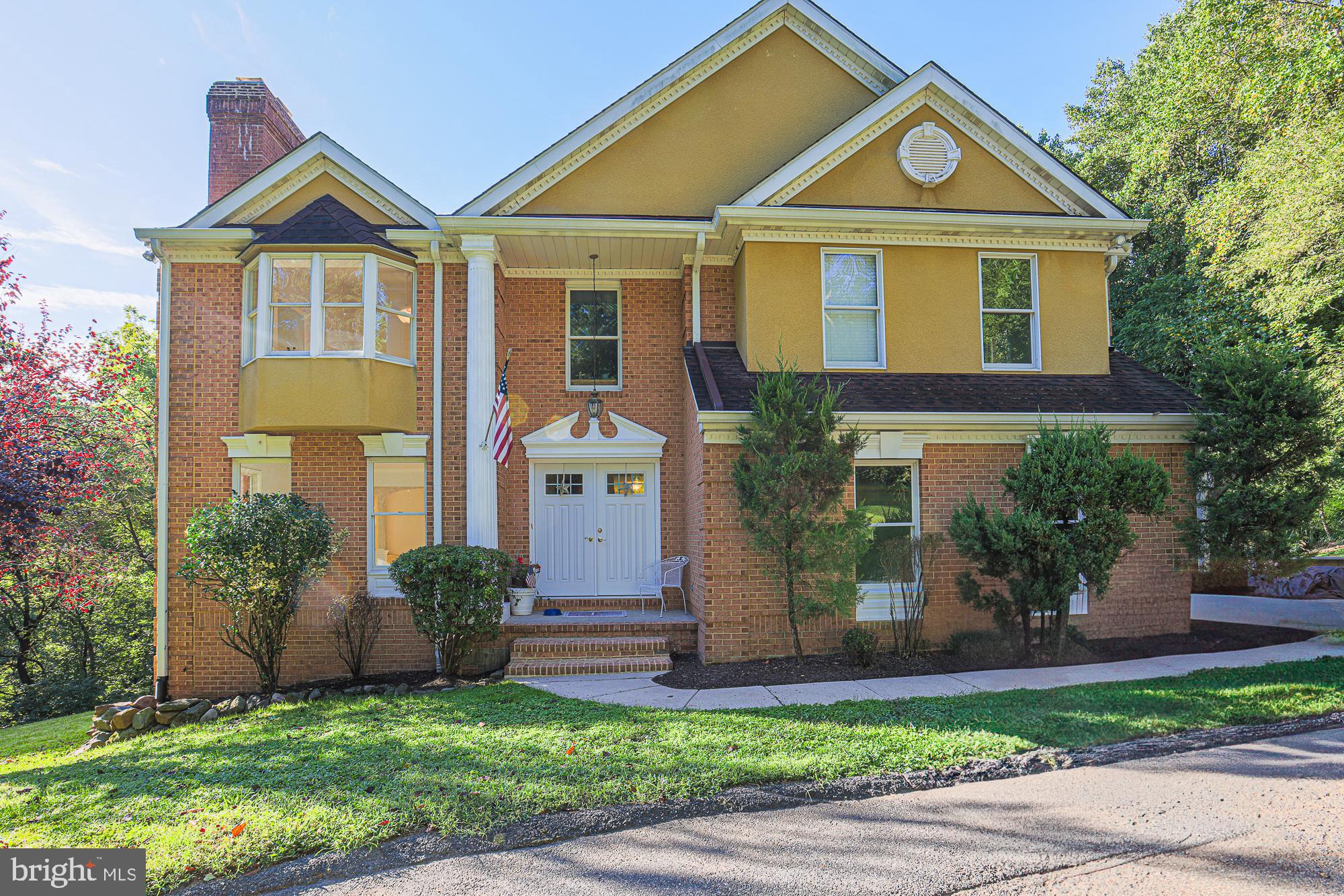 ORIGINAL OWNER/BUILDER. BEAUTIFUL SPACIOUS 5 BEDROOMS 3.5 BATHS ALL CUSTOM BRICK COLONIAL. SECLUDED 2+ ACRES ON PRIVATE LANE W/HIKING TRAILS! OVERLOOKING GUNPOWDER STATE PARK & STREAM, WITH A LARGE TWO-TIERED DECK. LOWER LEVEL HAS A CUSTOM BRICK YEAR-ROUND FIREPIT FOR COOKING OR BONFIRES. CIRCLE DRIVEWAY IN FRONT OF DOUBLE FRONT DOOR ENTRY TO AN OPEN 18' FOYER. EXPANSIVE 30X12 EAT IN KITCHEN W/ISLAND AND BREAKFAST BAR, ALL GRANITE COUNTERS, STAINLESS STEEL APPLIANCES, LARGE WALK-IN PANTRY W/SEPARATE FREEZER. FORMAL DINING ROOM W/NATURAL OAK FLOORS. NEW CARPET THROUGHOUT. FAMILY ROOM IS OFF THE KITCHEN WITH ANOTHER WOOD BURNING FIREPLACE W/ 18' BRICK FACING AND SLIDERS W/TRANSOM WINDOW. PRIMARY SUITE/WING INCLUDES A WOOD BURNING FIREPLACE CATHEDRAL CEILINGS, WALK IN CLOSET W/CATHEDRAL CEILING AS WELL FOR EXTENDED STORAGE AND LAUNDRY CHUTE. HUGE BATHROOM W/ 2 PERSON CORNER JETTED SOAKING TUB W/ WINDOWS ON ALL SIDES, SEP SHOWER AND DUAL VANITIES. SEPARATE SITTING ROOM AND WALK OUT 3RD FLOOR BALCONY. THERE'S ANOTHER ROOM OFF THE GARAGE/WOULD BE GREAT FOR AN OFFICE OR ANOTHER BEDROOM. PARTIALLY FINISHED WALK OUT BASEMENT WITH A BEDROOM, LG WALK-IN CLOSET AND A FULL BATH W/ JACK & JILL DOORS. CONVENIENTLY LOCATED NEAR 695, 95
