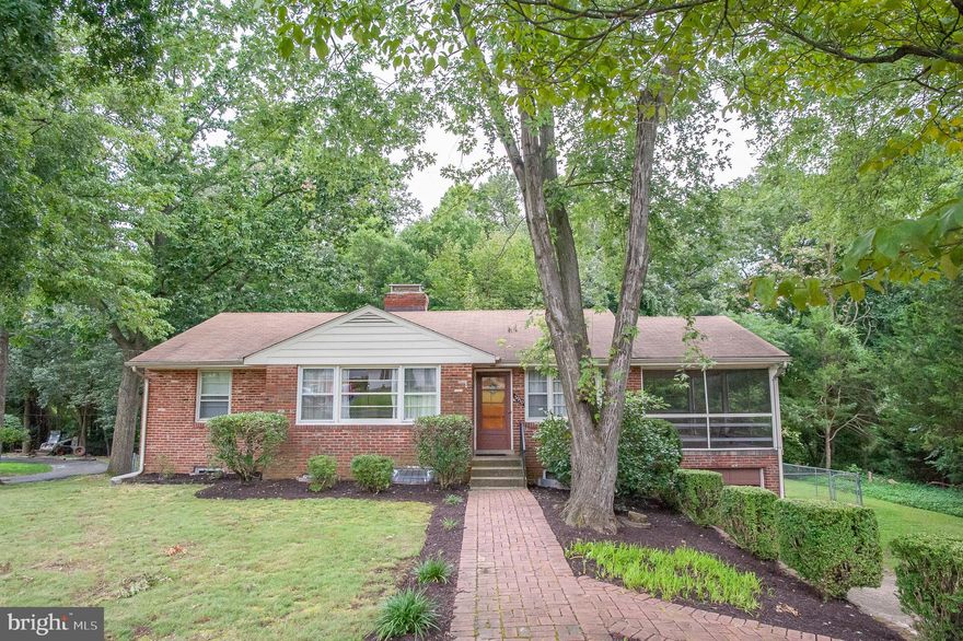 Welcome to 5950 Clames Drive, a delightful brick single-family home located in Alexandria's desirable Walhaven.  This home is sited on a half-acre lot, backs to mature trees, is all neutral and features plenty of light.  The bright dining room has chair rail, custom built-ins and a door leading to the spacious screened-in porch that is perfect for relaxing or entertaining guests.  The living room has an oversized window allowing tons of natural light.  Below, there is a patio and fully-fenced rear yard.  On the lower level you'll also find a large rec room, 3 bonus rooms and a laundry/utility room with lots of storage options.  Located just moments from all major commuter routes, this charming home offers an easy commute to Fort Belvoir, the Pentagon, and downtown D.C.  You will love living close to the fun shops and restaurants at Kingstowne and Springfield Town Centers.