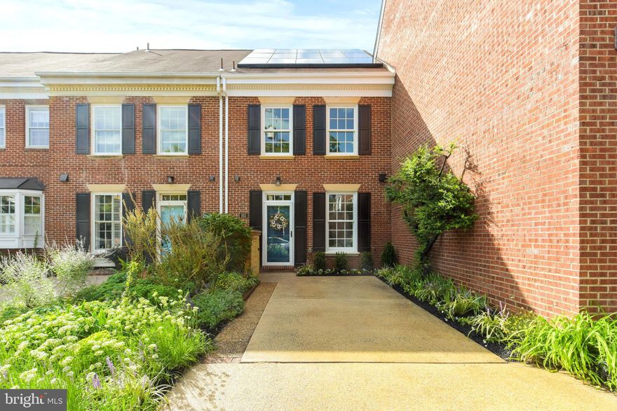 Find your wow factor at this gorgeous newly renovated three-level brick townhouse with coveted driveway parking just a short stroll to King St. metro, Whole Foods and an abundance of fun shops, boutiques and restaurants in Old Town Alexandria.  Delightful front garden with native plants invites you into over 1,700 SF of above ground living space accentuated with geometric glamourous design and irresistible luxurious upgrades throughout: stylish kitchen with brand new smart stainless steel appliances, quartz countertop, quality soft close cabinetry and beautiful tile backsplash; open living/dining layout with wood burning fireplace, built ins and French doors to a fully fenced serene patio oasis; three generously sized bedrooms with ample closet space; upscale bathrooms and powder room with trendy fixtures, custom vanity with quartz countertop and storage tower in ensuite primary bath; bonus storage room and bedroom level laundry for added convenience.  Fantastic location in vibrant southwest quadrant offers pedestrian friendly lifestyle, easy access to river front attractions, parks, water taxi through free trolley and sought after Lyles Crouch elementary school.  Fee simple with no HOA fee.  Solar panel owned free and clear with net metering energy credit capability.  Enjoy the interactive tour with integrated photos and floor plans.  Open house Sunday 2:00-4:00pm.