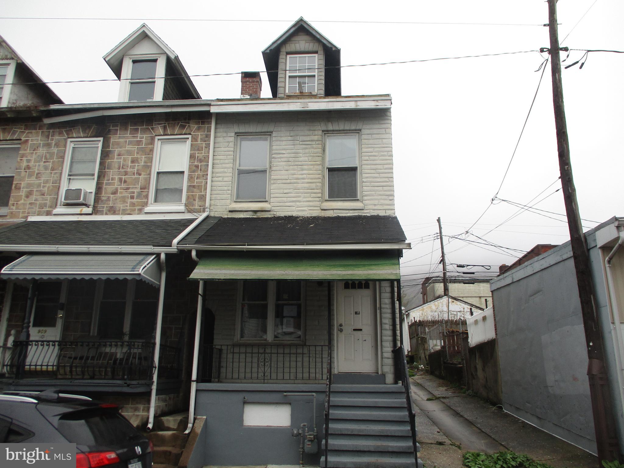NE Reading row end unit offering 3 bedrooms, updated full bath, off street paring in the rear and immediate possession. All flooring has been changed to tile & home has had some upgrades in the recent past. This home is in a very convenient location to downtown and major roads going towards Philly, Allenton or Schuylkill County. No grass to cut in the rear too!