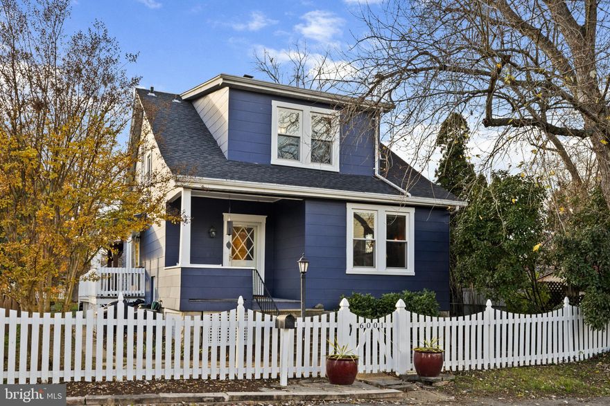 RARELY AVAILABLE.  Charming updated 1939 porch front cottage on a quiet dead end street in Baltimore County, yet close to the conveniences of Roland Park and the Falls Road area.  3 bedrooms, 2 1/2 baths, Central AC, recent roof, replacement windows, spacious eat-in updated kitchen, original moldings, vintage pine floors, high ceilings  all contribute to the charm of a country style home located close to the city amenities and access routes.   The pergola covered back deck overlooks a fenced level yard with a  large storage shed/ workshop , and a rear 2 car parking space.  Enjoy easy access to the Lake Roland Park hiking trails and dog park. County schools include West Towson Elementary, Dumbarton Middle, and Towson High.  Convenient to Roland Park,  restaurants, shops, schools, and light rail.