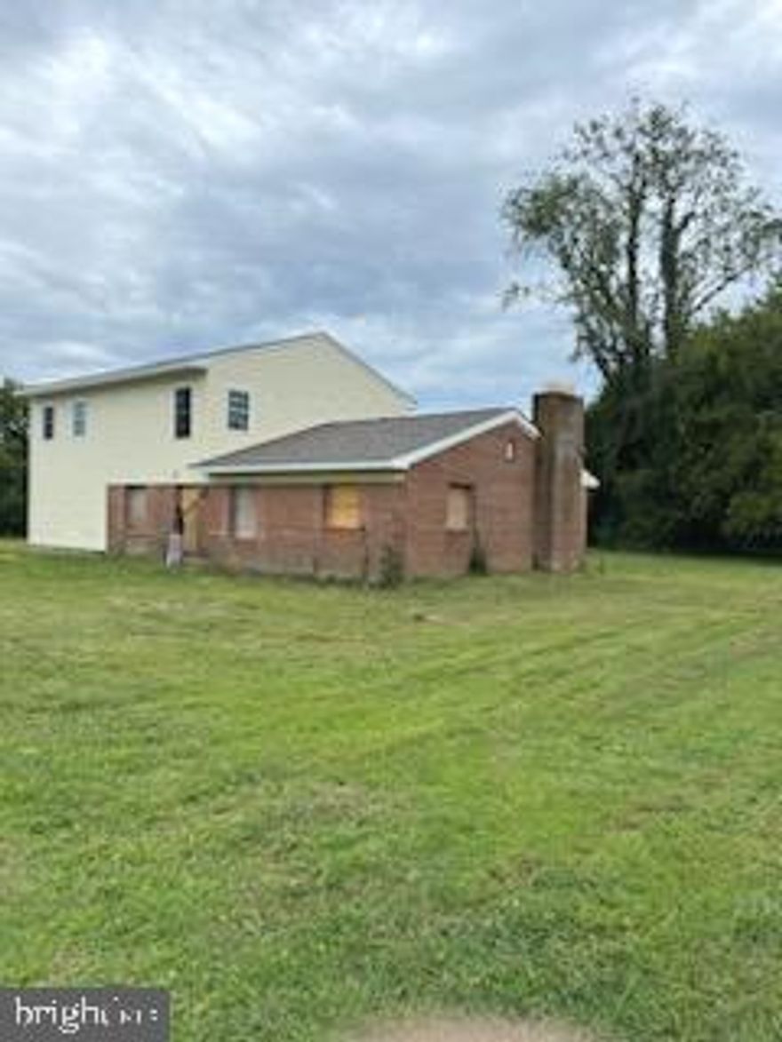 Price reduction!!! Motivated Seller!!!  Septic and well updated in 2023. Please make your best offer.  All offers will be considered. Brick Rambler located in the Mill Point Beach Community.  The house has 1518 square feet of living space. The original floor plan included 3 bedrooms, 1 and a half bath. The home is an investor/ handyman special sold as is. The house has been completely gutted. The current owner started the renovation by adding new rafters, new roof and a new foundation slab. The adjacent lot 5 tax ID is included. The total of the two lots equal  .5250 acres. Well and septic installed.