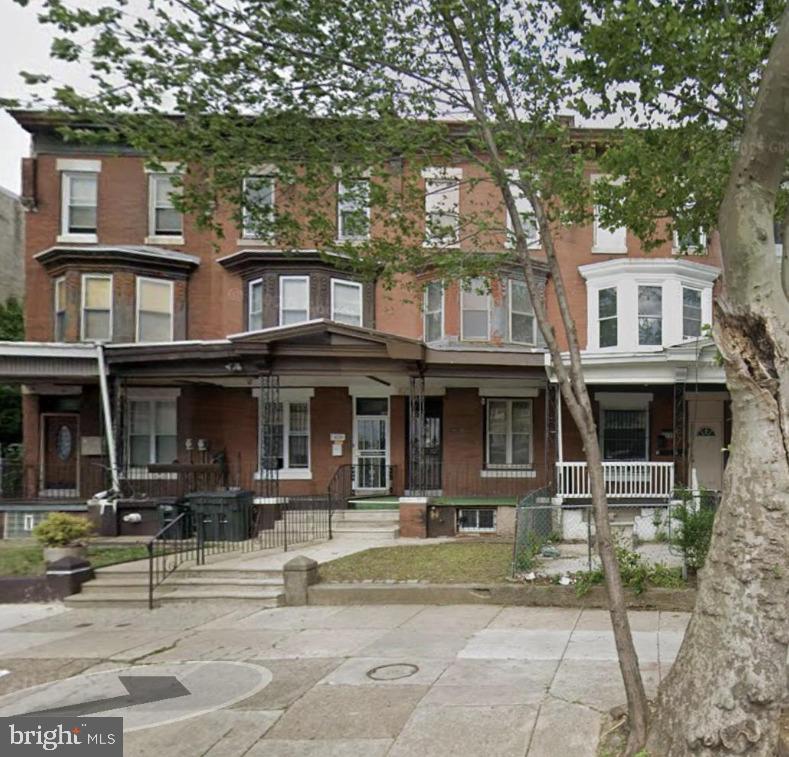 Gross monthly rent: $3245. Legally zoned triplex with 4 paying tenants. Gross Annual Income: $38,940