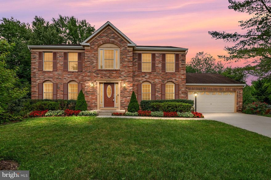 Fall right in love with this beautifully maintained home! This stately brick-front colonial offers timeless curb appeal and lush, mature landscaping that wraps around both the front and back of the property—truly a gardener’s dream. Step inside to gleaming hardwood floors throughout the main level, elegant formal living and dining rooms with detailed trim and molding, and a beautifully updated kitchen featuring matching stainless steel appliances and sparkling granite countertops. Enjoy coffee in the breakfast area with a bay window view overlooking the expansive deck. The cozy family room boasts hardwood flooring and a classic wood-burning fireplace, while the screened in sunroom is a showstopper—flooded with natural light and overlooking the expansive, picture-perfect backyard.  There’s even built-in seating!  Upstairs, you'll find four generously sized bedrooms with neutral paint and great closet space with cedar accents.   Enjoy the spacious primary suite complete with an oversized walk-in closet and private bath with marble dual sink vanity, large soaking tub and separate shower. The enormous unfinished basement provides endless potential for storage, recreation, or future finishing. The outside is lush, green, and filled with endless appeal.  Enjoy mornings on the expansive rear deck overlooking the private, lovingly landscaped backyard, or lounge on the quiet screened porch and enjoy the breeze while admiring nature.  This one checks all the boxes—space, charm, and unbeatable outdoor beauty.  Community pool too! Stay tuned!