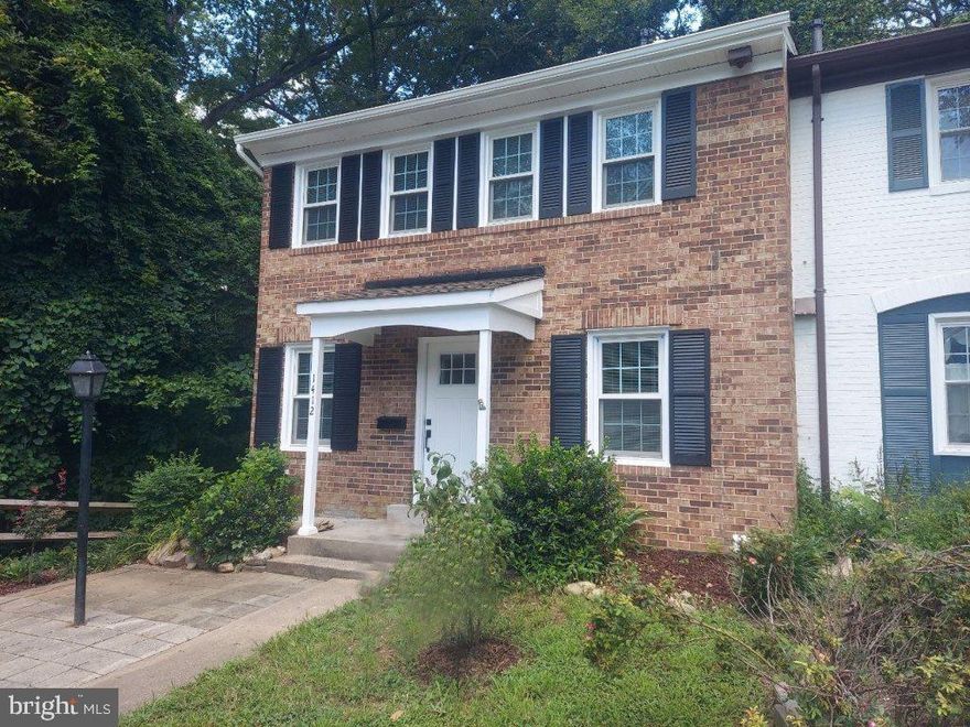 Lovely end unit townhome. Luxury laminate floor on all 3 levels. Remodeling was just completed. New deck, 3  new full baths, all new AC system, new flooring, new kitchen and appliances, recessed light throughout the house, new roof, new washer and dryer, all bedrooms with new ceiling fans, come buy and see it before it's gone.