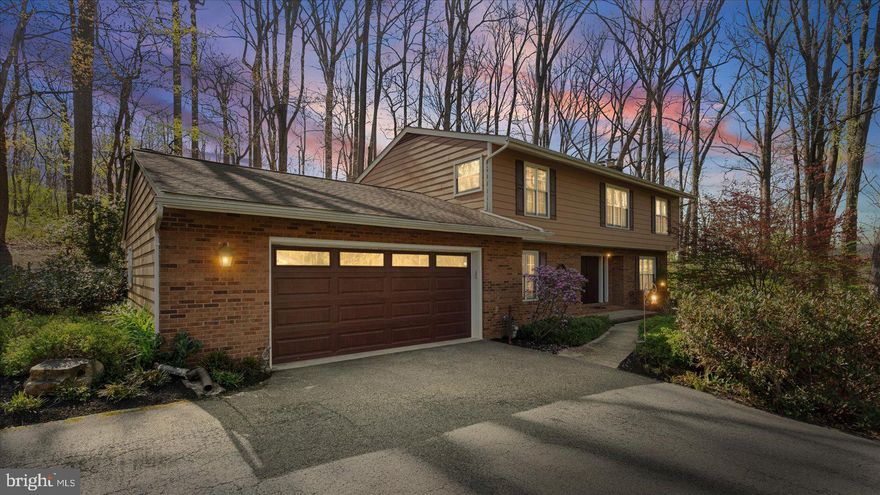 The perfect escape awaits. Discover the best of both worlds—peaceful, scenic living just steps from Loch Raven Reservoir, with easy access to Towson and major commuter routes. This stunning 4-bedroom, 3.5-bath Colonial blends timeless charm with modern updates, offering a lifestyle that feels like a retreat every single day. 

From the moment you step inside, you’ll notice the refined finishes, quality craftsmanship, and seamless flow from room to room. At the heart of the home, the Chef’s Kitchen and living room create an inviting gathering space—perfect for everything from casual mornings to lively celebrations. The Jenn-Air gas stove is top of the line, along with high end appliances. The dining room offers generous seating for hosting, and the sliding glass doors open directly to an expansive multi-tiered deck overlooking beautifully landscaped gardens—an ideal setting for indoor-outdoor living. The enormous second living room is a perfect space for congregating. 

Convenience meets style on the main level with a powder room, laundry room, and easy access to the attached two-car garage with ample work space.

Upstairs, the Primary Suite is a true sanctuary with brand new carpet. Privately set apart from the additional bedrooms, it features a spacious dressing area with mirrored walls and abundant closet space, leading into a serene bedroom retreat with room for a sitting area. The spa-like primary bath includes a separate glass-enclosed shower for a refined, relaxing experience. Three additional bedrooms and one additional bathroom complete the upper level.

The lower level offers incredible versatility—perfect for movie nights, music, or a quiet retreat—and has even served as a fifth bedroom. With a second wood-burning fireplace and a full bath, this space is as functional as it is inviting. An unfinished area provides a workshop and expansive storage.

This house is not just a home, it is part of a community! Windemere is not just a neighborhood, it is a place where neighbors are friends, front porches are living rooms and the community comes together to support each other. There is a yearly block party, seasonal celebrations and a dog walking circuit.  Food truck Wednesdays bring people from the neighborhood and surrounding areas to the Long Green Volunteer Fire Company for great food and laughs. 

This exceptional home delivers the lifestyle you’ve been searching for: tranquil surroundings, thoughtful design, community environment, ample privacy, and close proximity to shopping, dining, the reservoir, top-rated schools, and major roadways.

A few dates to note: Primary Bedroom and Third Bedroom Carpet (2026), Miele Dishwasher (2025), Water Heater (2024), Garage Door System (2022), Floors (first floor 2021), Roof (2020), Attic Insulation (2020), Washer (2019), Kitchen Countertops (2019), Kitchen Backsplash (2019), Garage Door (2018), HVAC (2018), JennAir Stove and Hood (2018), Well Tank (2018) and more.

A truly special opportunity you won’t want to miss.