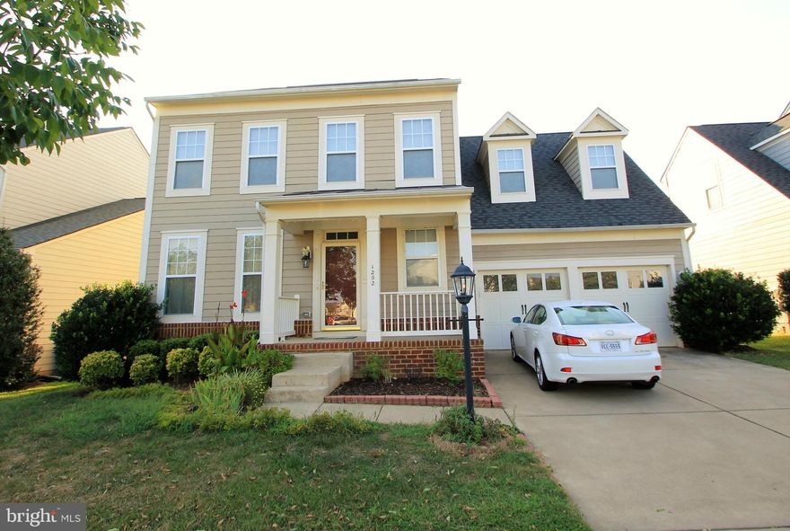 Beautiful Custom Home in Amenity Filled Subdivision Close to Everything. Spacious Open Floor Plan Loaded with Upgrades. Gourmet Kitchen with Island, Corian Counters, and Stainless Steel Appliance Pkg. Large Family Room with Marble Wrapped Gas Fireplace and additional Window Filled Bonus Room. Master Suite with Walk-in Closet and Luxury Bath. Oversized Bedrooms with Lots of Closet Space. Huge Bsmt!