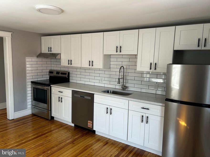 Be the First to Live in This Beautifully Renovated 1-Bedroom Apartment! Step into your new home, featuring a new kitchen, a completely remodeled bathroom, and gorgeous refinished hardwood floors.  Enjoy an abundance of natural light that fills every corner of this inviting space. Located just minutes from downtown, you’ll love the convenience of being close to shops, restaurants, and local amenities. Plus, you’ll have your own designated parking space for added ease.