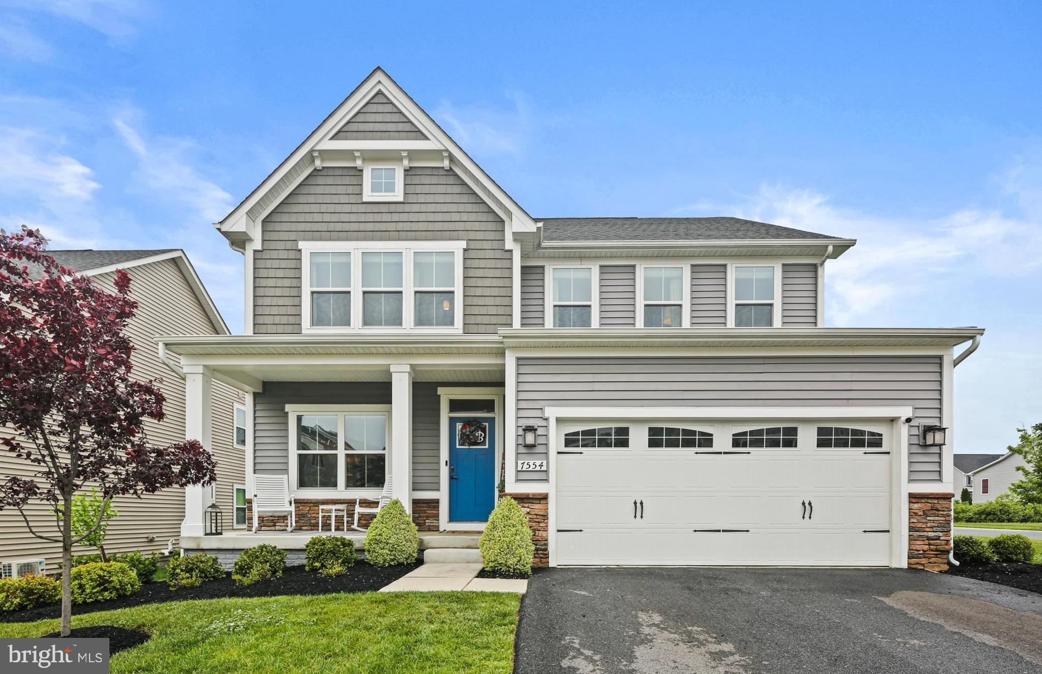 Welcome to 7554 Newmanstown Drive, a stunning single-family home in the desirable Shipley Homestead community of Hanover, MD. Built in 2019, this spacious Columbia model by Ryan Homes offers 5 bedrooms, 3.5 bathrooms, and over 3,200 square feet of beautifully designed living space. The open-concept main level features a gourmet kitchen with an oversized island, stainless steel appliances, gas cooking, and flows seamlessly into the dining and living areas—perfect for entertaining. Upstairs, you'll find four generously sized bedrooms, including a luxurious primary suite with a walk-in closet and spa-like bath, plus the convenience of a washer and dryer on the upper level. The fully finished basement includes a fifth bedroom, a full bathroom, and additional living space—ideal for guests or multigenerational living. Step outside to a private patio and take some time to unwind in the relaxing 5 seat salt water jacuzzi while overlooking the fully fenced backyard that opens to scenic common space and tranquil woods. The patio also offers a built in stone fire pit, perfect for evening hangouts. Additional features include a tankless water heater, 2-car garage, and access to exceptional community amenities including three pools, a clubhouse, fitness center, dog parks, and playgrounds. Located just minutes from Fort Meade, Arundel Mills, and major commuter routes—this home offers the perfect blend of comfort, privacy, and convenience.