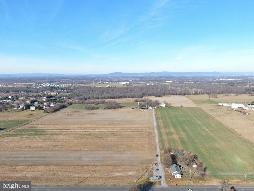 OUTSTANDING 125± ACRE FARM IN WASHINGTON COUNTY, MARYLAND! The beautiful Lehman Farm has been in the same family for 72 years making this a once in a lifetime opportunity. Lehman's Sweet Corn and Produce has been in business there for over 50 years and continues to have an established buyer base. The approx. 80± acres of tillable ground lays flat making it easy to farm. Yields on soybeans of 50/bushels an acre with the front fields averaging 60-62/bushels an acre. High-producing soils extend through the farm including Duffield and Hagerstown soils. Farm buildings include a 50x60 equipment shed, 20x60 lean-to, 17x25 milking parlor (no equipment), 16x24 milking parlor (no equipment), 12x18 milk house with tank, and 20x60 Sollenberger silo. The large farmhouse includes 8 bedrooms, 5 full bathrooms, large living room, family room, kitchen, dining room, laundry room, large loft with kitchenette, and basement. Lewrene Farm Bed & Breakfast operated for many years from the farm. A new roof has been approved and will be installed prior to settlement weather permitting. The name and or business of “Lehman’s Sweetcorn and Produce” does not convey with the sale. This property will be offered at auction on Friday February 16, 2024 @ 1:00PM.