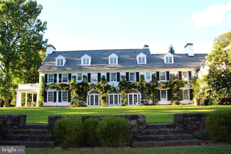 SummerHill is an extraordinary country estate set down a long lane in sought after Radnor Hunt. Elegant 1910 manor home with 1926 addition originally built as a summer home for prominent Philadelphians. It is believed to be designed by the venerable Frank Furness architure firm at the turn of the century. Gracious living and entertaining is afforded by the perfect setting atop a rolling hill that Willistown Township, Chester County is so well known for.  5+ bedrooms in the original section with 3.5 bathrooms. The third floor consists of a large bathroom, 4 bedrooms and a large living room with stunning long views on 3 sides and could be renovated for additional living space or as an in law suite. The two story front entry hall with elevator opens into the sunroom which runs the length of the building with southern exposure to secluded lawn and fabulous stone walled terraced gardens. On right is the living room with extraordinary western views, large mantel and covered porch. FMLY room, dining room each with fireplaces bring you to the butlers kitchen and 1926 addition with another kitchen, living room, den and 3 bedrooms above. Also attached is a separate 1 bedroom guest cottage. Outbuildings include a small cottage / doll's house with a lovely fieldstone working fireplace wall, a stone hexagonal potting shed / root cellar and two sets of garages with space for a total of 6 cars. Previous owners have donated much of the orignial lands to Natural Lands Trust, giving SummerHill a sense of un-matched tranquility and privacy. Within 45 Minutes of Philadelphia, 25 minutes to the PHL airport, close proximity to the R5 rail and Amtrak, the Great Valley school district, the many PVT schools and all the Main Line and Radnor Hunt has to offer.