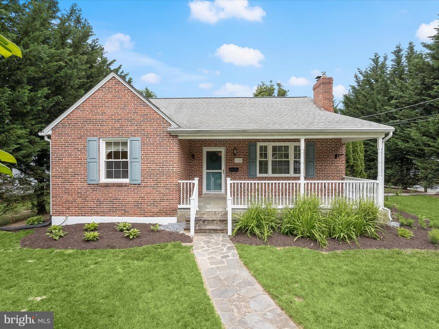 Welcome to 1100 Edmondson Avenue, a charming home nestled on a beautifully landscaped corner lot in Catonsville. This home offers both comfort and convenience, featuring a private driveway and a welcoming covered front porch. Inside, the main level boasts hardwood floors throughout, creating a warm and timeless feel. The spacious living room is highlighted by a cozy gas fireplace with mantel, while the adjacent dining room features classic moldings and opens to an expansive rear deck perfect for entertaining or relaxing. 
The kitchen is thoughtfully designed with granite countertops and ample cabinetry, providing both style and function. Two well-appointed bedrooms and a full bath complete the main level, including a convenient laundry area in one of the bedrooms. Upstairs, a large and versatile bedroom with a cedar closet offers additional living space.   The lower level presents a fantastic opportunity for an in-law or teen suite, featuring a full kitchen with granite countertops, a bedroom, full bath, bonus room, and an optional private entrance ideal for multigenerational living or guests. The home also includes a ramp to the deck, a shed with electricity, a rear patio and is situated just moments from the restaurants and shops of Catonsville and the Trolley Trail to historic Ellicott City.  Some photos have been virtually staged