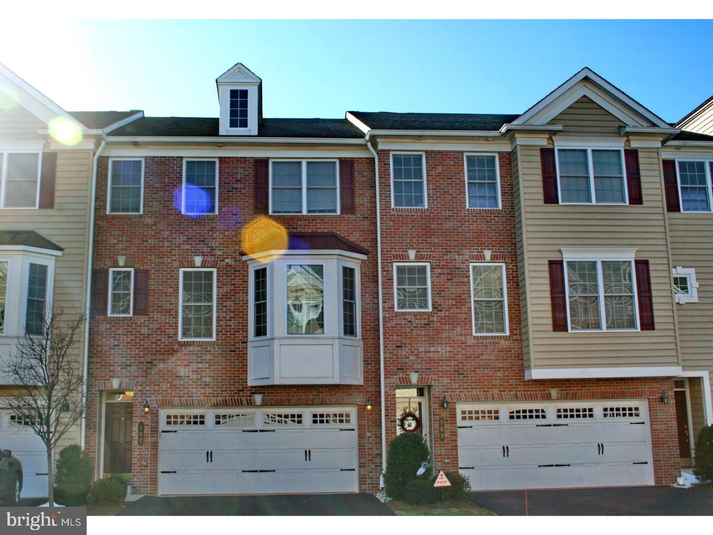 Ready to Move-In! Spacious, open floor plan, and bright 3 bedroom 2.2 bath 2 car garage townhome is situated in the heart of downtown Ambler with walkable distance to Ambler Train Station. Main floor offers beautiful hardwood floors in great/living room and dining area. Upgraded kitchen with quartz counter tops, under-mount sink, 42' cabinetry, recessed lights, adjoining bright breakfast room with large slider to elevated deck. Large great/living room with some upgraded trim work, and powder room. Open dining room adjoins to great/living room creating more space for large gatherings. Upper floor features large master with full bath, walk-in closet, and tray ceilings. Other two ample size bedrooms with full hallway bath and laundry room. Finished lower lever family rooms with large slider to back yard, additional powder room, and door to two car garage. This home is conveniently located just a short walk to train station, seasonal farmer's market, shops, restaurants and movie theater. Wissahickon School District! Easy to show!