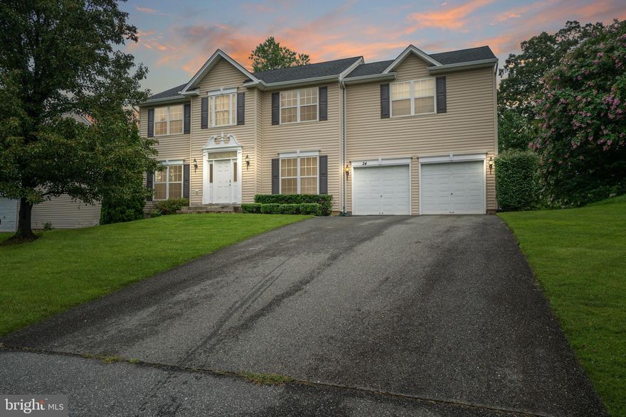 Welcome home to 24 Appletree Lane in the Stafford Oaks community! This gorgeous four bedroom home has been exceptionally maintained and is ready for you to move right in and make it your own! Equipped with a tank-less water heater for endless hot water, new A/C systems and a roof that was installed in the past 3 years, you'll live comfortably knowing that you've got updated and energy efficient systems in your home! Walk inside and be greeted in the grand foyer and from there enjoy the vast living space this home offers. Stainless steel appliances in the kitchen as well as a kitchen island is perfect for entertaining! Living room equipped with a gas fireplace is perfect and cozy on those brisk nights! Off the kitchen you'll find a great sun room/eat in area - a great use of space! You'll also find a formal living room perfect for an home office as well as well as a formal dining room! The basement is fully finished perfect for a play area or home theater. Upstairs you'll find your tranquil master suite with two walk in closets! All this just minutes from I-95, local shopping and dining. You'll love all this home has to offer!