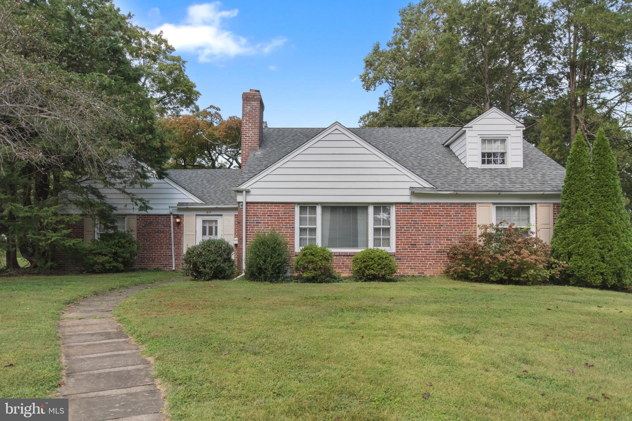 Welcome to 217 Sykes Lane.  Central Air,  Hardwood floors throughout. Roof (2013) Step back in time, same owner has loved this home since 1954. Large brick cape in Wallingford Swarthmore School District.  Charming foyer front entrance with coat closet and inside access to the 2 car garage. Bright living room has wood burning fireplace and open staircase. Eat in kitchen with door to the screened in back porch.  Formal dining room, full bathroom and two first floor bedrooms. Second level includes 2 spacious bedroom and a full bathroom. Unfinished basement. Large level back yard.  Lots of charm just needs the new owner to bring their TLC. This home is being sold in AS-IS condition. Buyers will be responsible for the Township Use and Occupancy. Home is Where Your Story Begins!