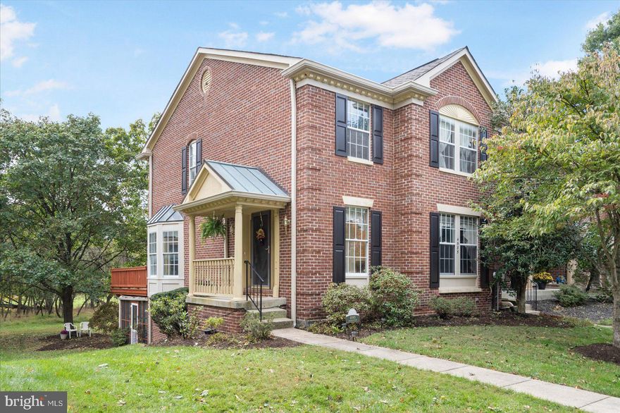Welcome to your new home, sweet home! This stunning three-bedroom, three-and-a-half-bath end-unit townhouse is nestled in the sought-after Dorsey Hall community, offering a slice of paradise in Ellicott City. Boasting 2400 square feet of open, airy living space, this charmer will have you at "hello" with its elegant brick exterior and quaint side porch—perfect for sipping your morning coffee or evening tea.

Step inside to discover beautiful hardwood floors leading you through to a gourmet kitchen that screams chef’s delight. Here, you'll find cherry custom cabinetry, sparkling granite countertops, top-notch stainless steel appliances, and a pantry big enough to hide your guilty snack pleasures. The living room, complete with a wood-burning fireplace and a bay window, is the ideal spot for cozy movie nights or hosting lively game evenings. French doors open to a spacious deck with spectacular views of green spaces, where wildlife spotting could become your new favorite pastime.

Venture upstairs to find skylit hallways, a convenient linen closet, and three inviting bedrooms. The primary bedroom is a true retreat featuring vaulted ceilings, a walk-in closet, and an ensuite bathroom with dual vanities and a walk-in shower to wash away the day. The walkout basement serves up flexible space for an office den, extra bedroom, or that hobby room you’ve always wanted. This home is also the only one in the community that offers a private screened-in patio, promising plenty of serene outdoor moments.

Recently updated with a new roof (2020), brand-new HVAC system (2024), and new flooring, this home is ready to start its next chapter with you. Don't let this gem slip through your fingers—come see why life is just better here!