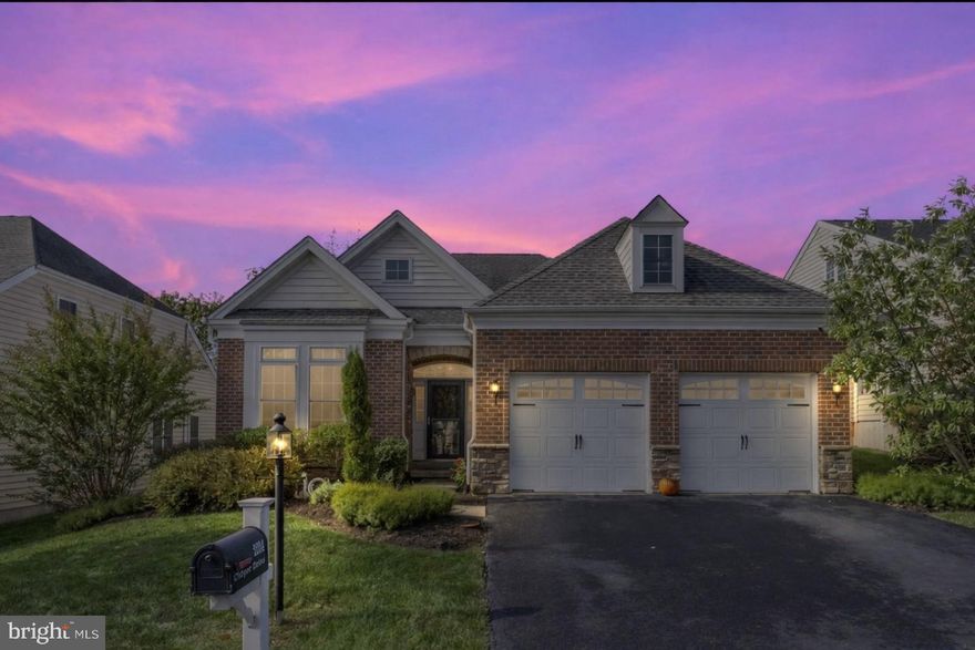 Welcome to 2234 Cooper Drive! Meadow Glen is a premier 55+ community built by Toll Brothers. Enjoy easy one-floor living in this bright and spacious 3-bedroom, 2-bath home featuring 10 ft ceilings, intricate crown molding throughout, and large windows that fill the home with natural light. The spacious kitchen offers granite counter tops, a large pantry, and an open layout to the dining and living areas - perfect for entertaining. The expanded primary suite includes a tray ceiling,  private bath with heated floors and walk-in closet space. Additional features include an expanded two-car garage, upgraded hardwood flooring, extended outdoor patio with awning and convenient main-level laundry. Beautifully maintained community with resort-style amenities and a welcoming neighborhood atmosphere. Don't miss the opportunity to make this beautiful home the ONE!