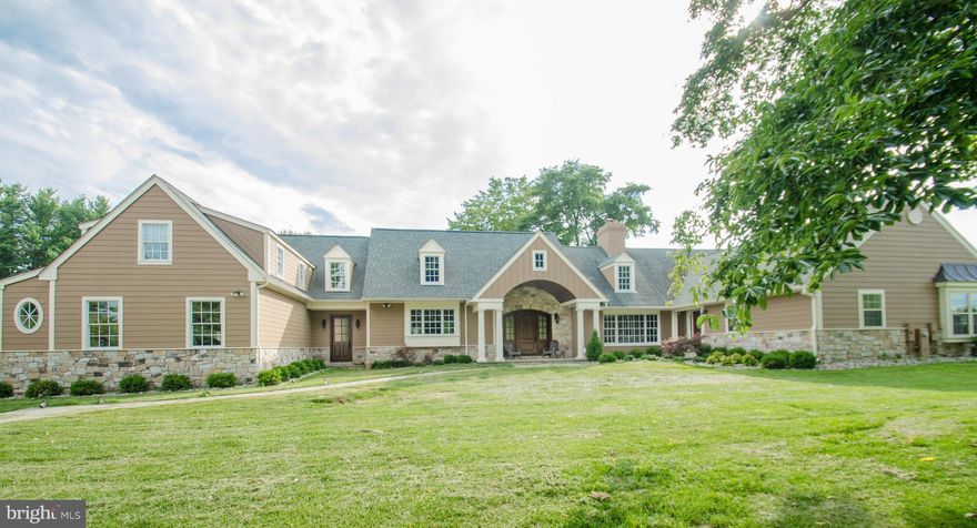 Very large, 6500 sq feet plus, secluded home with 4 Bedrooms and 5 full bathroom including new addition with one of a kind Kitchen, Family Room, Mud room 3 full bay garage with additional motorcycle bay, 1/2 bath, entertainment room, rec. room, also salt water pool, outside fireplace, lighted tennis court with bball. 3 woodburning fireplaces, all updated systems.