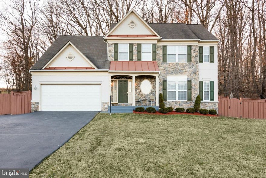 Plenty of space to entertain.   Large lot with large pool and patio.  Finished walkout lower level.  Spacious master bedroom with motorized skylights.  Open floor plan.  Plenty of parking with extensive driveway. Gas fireplaces in the Library and Master Bedroom.  Great location with Potomac Mills, Stonebridge, and I-95 within 3 miles. This beautiful home must be seen and will not disappoint.