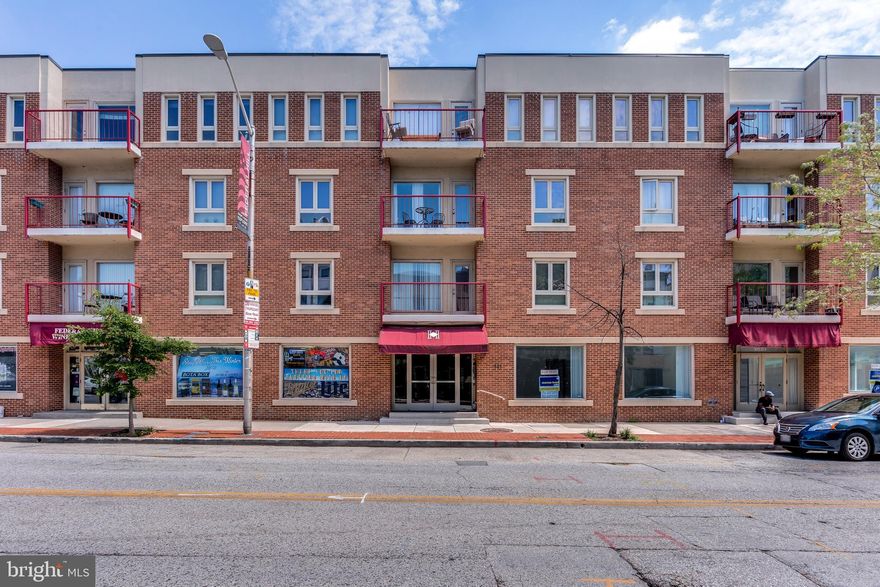 In the heart of historic Fed Hill, this is one very nice condo. Rare BRIGHT corner unit with plenty of windows , enjoying yourself on the deck surrounded by views, is what makes this place so desirable! This is a secured building and has 2 parking space right by the entry door to the elevator.  Out back is a large (common) patio that is accessible from level 2.  Now to the interior.  There is a wood burning fireplace in the living room for those chilly Baltimore evenings. The fully equipped kitchen has a  BRAND NEW GE range & BRAND NEW microwave and the dishwasher was replaced about 3 years  ago. The owners bedroom has a large closet and beautiful bath. The 2nd bedroom is spacious with plenty of windows and also has a large closet. The HVAC was replaced in August of 2015 by Michael & Sons, and all the sprinkler heads were replaced.  Both bathrooms were completely remodeled in July of 2019. This is a VERY nice condo within walking distance to all Fed Hill has to offer!