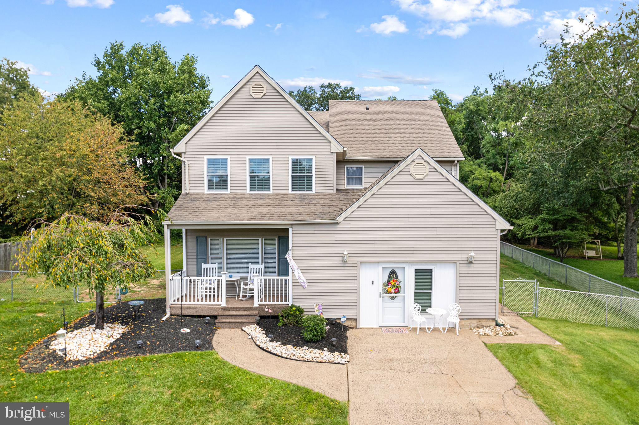 Welcome to the ONE you have been waiting for! Wonderful Move-In Ready and Perfect for making your own Home in Bucks County Estates. Inviting Front Porch to Sit back and take in the Scenery leads you into the main level featuring NEW Plank Flooring, NEW Crown Molding, First Floor Blinds and Fresh Paint in a neutral Palette. Spacious Light and Airy Living room with Ceiling Fan and Coat Closet. Full size Dining room for large Family Gatherings with Chair Rail molding Atrium door to the outdoors just steps steps off the Eat-In Kitchen offering updated Cabinets, Tile Backsplash, Corian Countertops, Stainless Steel Appliances, Radius Window and Glass Sliders to back Deck. Family room formally the Oversized Garage Remodeled with Ceiling fan, window and door can easily be converted back. Convenient Updated Hall Bath. Main Floor Laundry with Washer and Dryer. Second floor features the primary Suite boasting Cathedral Ceiling, Ceiling Fan and Spacious Bath featuring Soaking Tub, Stall Shower and Linen Closet. Two other generous size bedrooms and Updated Hall Bath complete the second floor. Third level features a Loft Bedroom and Storage room. Private Fenced Backyard features a Deck and Patio . Also their is an Underground Electrical Feeder to a Electrical Conduit with cable if you were interested in adding an outdoor Structure in the Backyard. A home that has been loved and enjoyed, ready for its next Chapter. Convenient location with so much to offer!