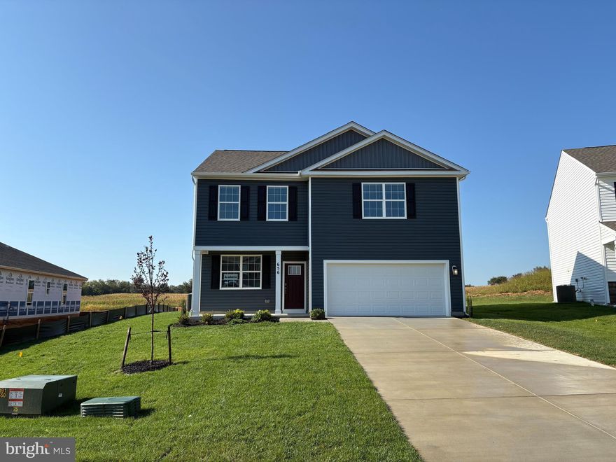 QUICK MOVE IN!!! This charming 2-story, 2148 square foot home is designed for both style and functionality. With four bedrooms and 2.5 baths, it provides plenty of space for comfortable living and entertaining. On the main floor, luxurious vinyl plank (LVP) flooring extends through the open living areas blending durability with a modern look. The kitchen is a highlight, featuring sleek quartz countertops and stainless steel appliances that bring a contemporary touch to the space. Ample grey cabinetry provides plenty of storage, and the kitchen flows seamlessly into the living area, making it easy to cook, dine and entertain. Upstairs, you'll find all four bedrooms, including a spacious owners suite with an en-suite bathroom. The additional three bedrooms share a second full bathroom, while a convenient half bath is located on the main floor for guests. The new home comes equipped with smart home technology including video doorbell, smart door lock, smart switch, smart plug, amazon echo pop, smart thermostat and smart panel that connects to your phone making it easier than ever to control your house no matter where you are! Take advantage of incentives and rate options using DHI mortgage, making your new home MORE AFFORDABLE than ever. This home offers a perfect blend of modern amenities, comfortable living spaces, and great upgrades making it a great option for you and your family.