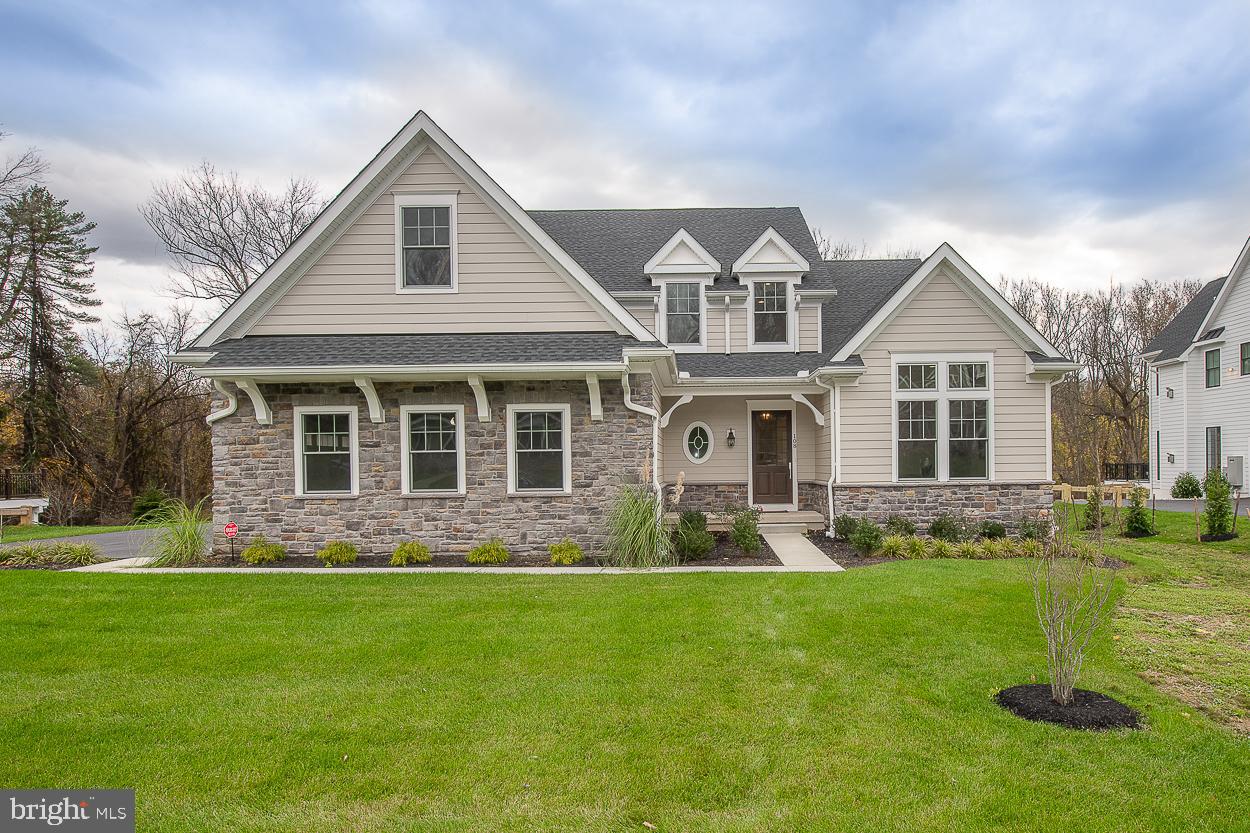 Welcome to 108 Harvard Ln in Bryn Mawr, a beautiful 3 Bedroom, 3.1 Bath Colonial in the lovely Woodlands at Bryn Mawr community, within the desirable Radnor School District, and available for immediate occupancy! This better than new construction, 1 year old Rutherford Model from Rockwell Custom homes features a main level with beautiful hardwood floors and custom mouldings throughout, airy 10 foot ceilings that extend through the Family Room, a stunning owner's suite with luxurious bath, a home office, and spacious gourmet kitchen with stainless steel appliances. The kitchen opens to a sun-filled Dining/Breakfast room. The first floor is completed by a laundry room and powder room. The second level boasts a versatile loft space overlooking the first level Family Room, as well as two additional bedrooms, both with en-suite baths. There is a large hall storage closet as well. A full, unfinished walk-out lower level with 9' ceilings provides a spacious blank slate for future finishing, and ample storage space. An easy to maintain TREX deck extends from the main level, offering the perfect place for outdoor dining, with stairs to provide access to the backyard. A three car garage offers ample space for vehicles with plenty of room for storage. This home is truly a must-see in a phenomenal community!
