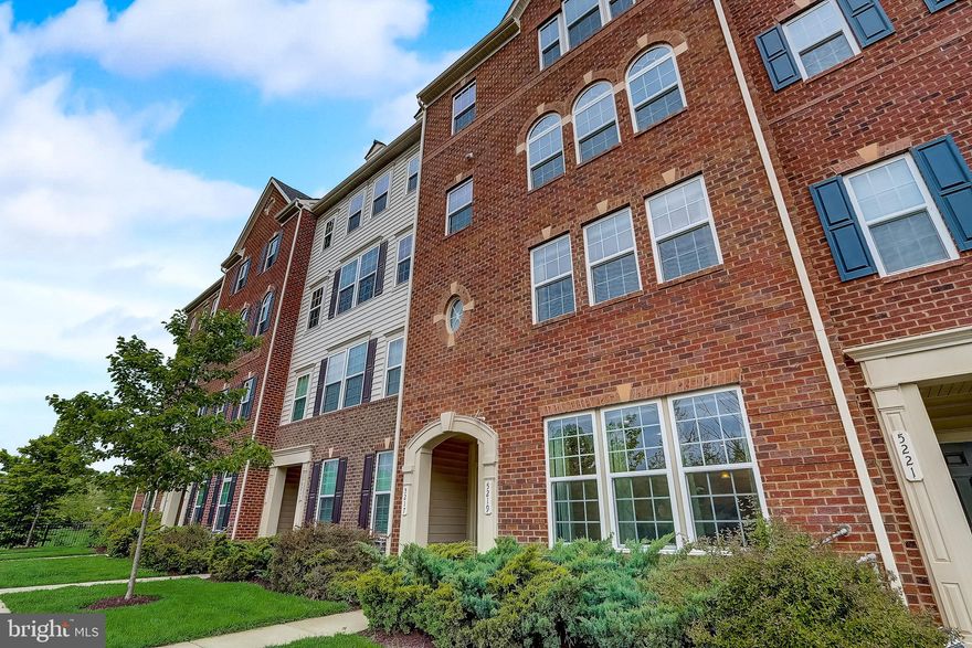 Welcome home to this perfect unit in Greenbelt Station. The 2 level 3 br. 2.5 bath condo/townhome is perfect for working professionals and families alike. This well maintained home features many upgrades including cherry kitchen cabinetry, granite countertops, stainless steel appliances and hardwood floors on the entire main level.  It also boasts an open floor plan,  an upper level laundry room with custom shelving,  a tankless water heater and a 1 car garage.  An alarm system conveys.  Conveniently located just off of I-495 at Greenbelt Station you can stay connected to everything you want and need. You can walk, drive or ride to your destination. Just a short drive from the University of Maryland – College Park and NASA Goddard Space Flight Center, Greenbelt is suitable for professionals and students alike. Commuting is a breeze as the community is just minutes from the Greenbelt Metro/MARC Station, Rt.1 and the Baltimore/Washington Parkway. Enjoy spending time within the community with its spacious sidewalks and tree lined streets. Grab your bike or just take a stroll along the trail, stop at the tot lot for a quick slide, or just chat with your neighbors while hanging in the park. There is so much to do here at Greenbelt Station. If entertainment, dining or shopping are more your speed, you can catch a movie, enjoy a meal or hit the stores at Beltway Plaza Mall just around the corner. Agents, front door faces the playground and not the street