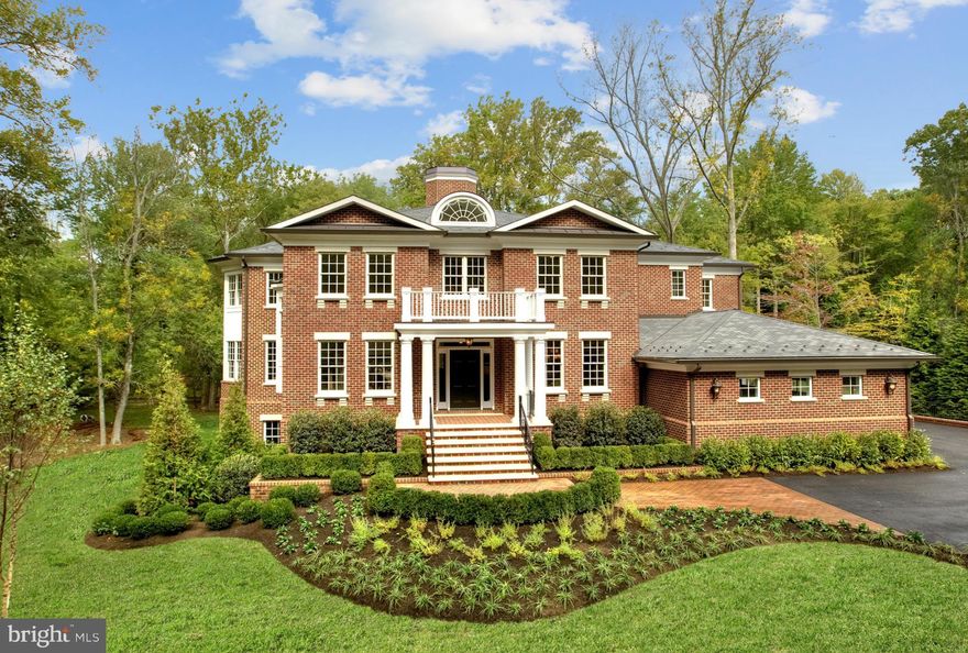 Georgian Estate - UNEXPECTED & spectacular INTERIOR built w/the finest craftsmanship & attention to detail. Amazing trim, marble baths, hardwoods thruout. Approx 10k sqft of exquisite & open spaces-a true masterpiece w/timeless appeal. 10ft+ ceilings, amazing natural light, shaft for elevator. Sited beautifully on huge, flat, private lot w/room for full size pool & extensive outdoor entertaining.