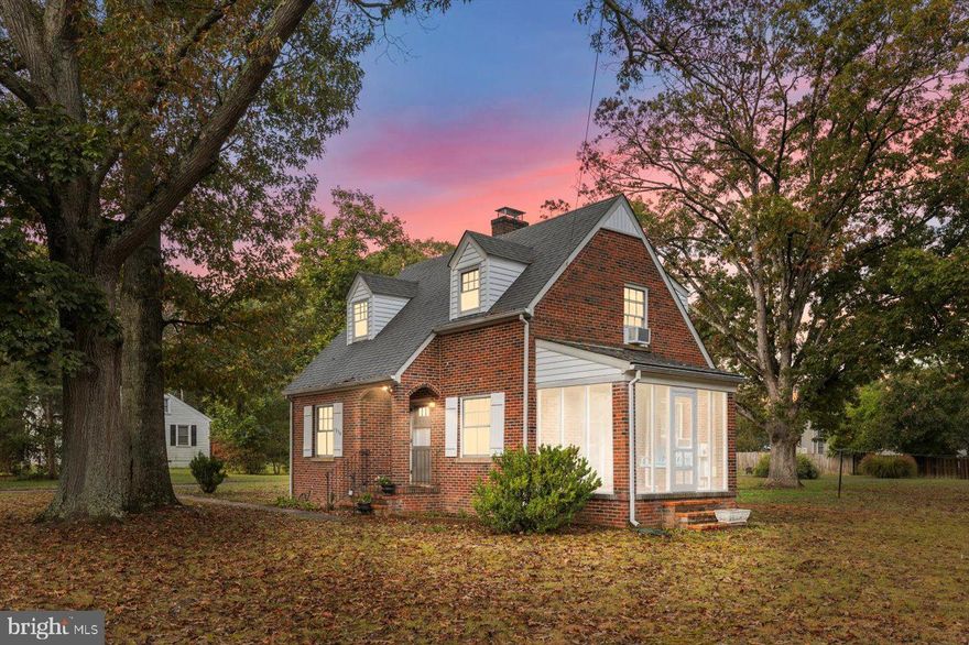 C H A R M.....1948 Cape Cod home with character of yesteryear. Enter the front of the home into the nicely sized living room with carpet over wood floors. To the left is the dining room (also with carpet over wood flooring. To the rear of the home is a kitchen with old cabinets that are in great shape, and a cute rear porch on the back. The living room has a brick fireplace with gas logs that have never been used. Spend a cool evening sitting on the side porch looking over the huge rear yard that has beautiful oak trees, a clothes line to hang clothes on for a fresh drying. Upstairs, enjoy two nice-sized bedrooms with wood floors and a full bath. The home has wood trim and solid wood doors for a beauty that you don't see anymore. The paved driveway leads back to a big 1.5-car garage with electric and a garage door opener. Also, a full unfinished basement that has a newer oil furnace. Look today and make this CHARMING home yours...before it's gone. Close to everything.