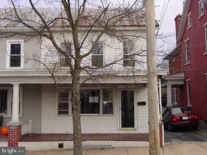Akron Semi with 2 Bedrooms, 1.5 baths, large eat-in kitchen, plus dining room that could easily be BR # 3 or a family room. Convenient 1st  floor laundry, ample closets space in bedrooms, walk-up attic, relaxing front porch & large shed. Your personal touches & a little TLC will make this home your own!