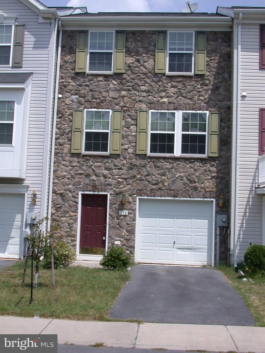 Great townhome-located just off of Route 11, the unit has a level backyard which backs up to a beautiful stream. Priced to sell, this unit 3 level unit has a foyer with wood flooring and a nice sized entry closet. The laundry area is on the main level in an unfinished area of the basement that has also been plumbed for a full bath.  The first upper level has a large living room with ceiling fan,  large kitchen with island, dining area with sliding glass doors to the deck. The kitchen has a pantry and great cabinet and counter space. Kitchen appliances include refrigerator with icemaker, gas range, microwave, disposer and dishwasher. The top level of the unit has a large primary suite with large closet and attached bath.  There are also two additional bedrooms and a hall bath.  The washer and dryer on the main level also convey. list of improvements available