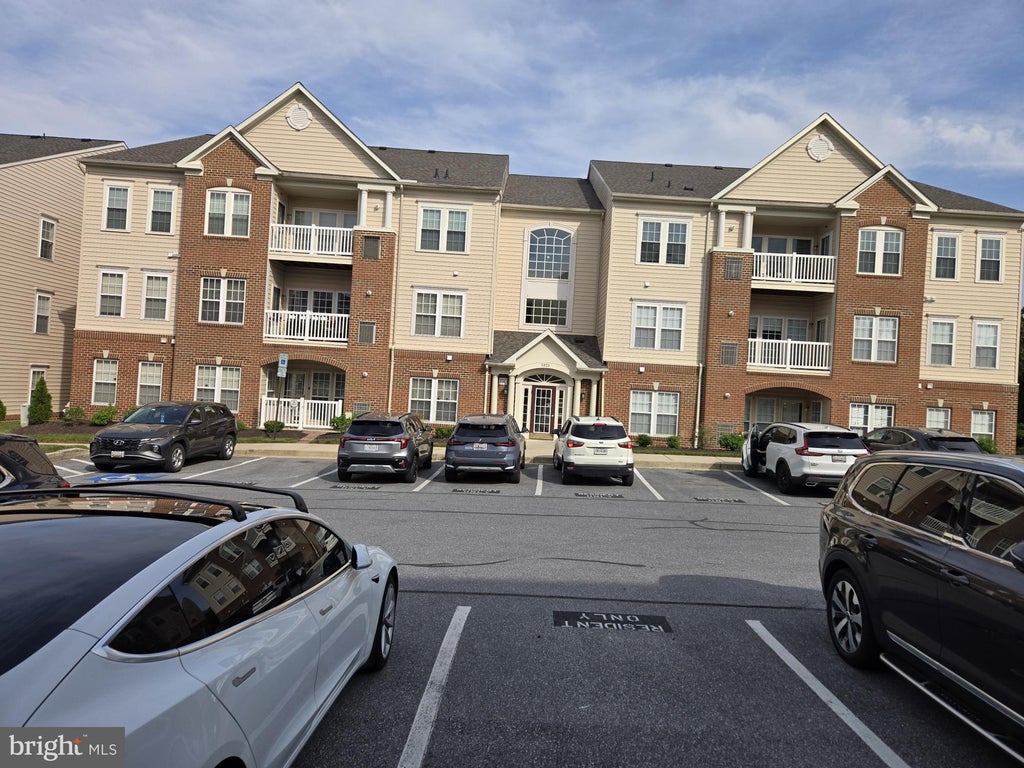 Photo of 5925 Abrianna Way #K, ELKRIDGE, MD 21075 (MLS # MDHW2070364)