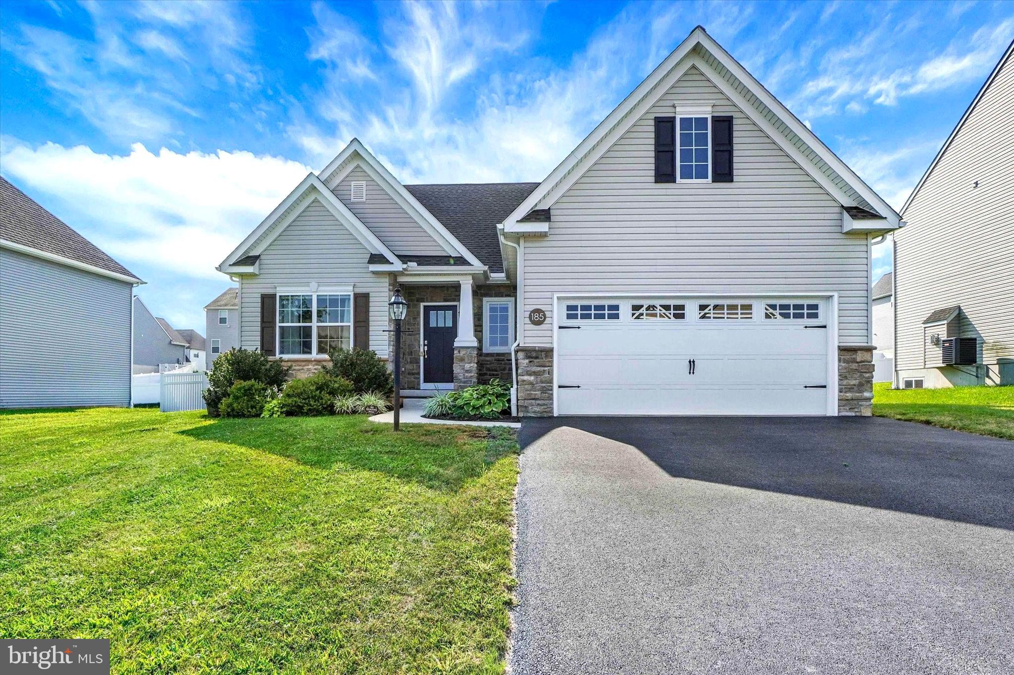 Introducing 185 Hollyhock Drive – a beautifully crafted home nestled among picturesque farmland, yet just minutes from premier shopping and dining destinations. Located in the sought-after Northeastern School District, this exceptional residence is part of the desirable Rolling Meadows at Rentzel Farms community.
From the moment you arrive, it’s clear this cherished property has been meticulously maintained and thoughtfully designed. Surrounded by expertly landscaped grounds, the home offers a tranquil setting that invites peace and relaxation.
Step into your private outdoor oasis—an ideal space for entertaining guests or enjoying quiet moments. Whether you're sipping coffee on a peaceful Saturday morning or hosting a summer barbecue, the patio and surrounding fully fenced in back yard provide the perfect backdrop for any occasion.
Inside, you're welcomed by a spacious and light-filled foyer that immediately feels like home. To your left, a versatile room awaits—ideal as a home office or cozy sitting area. Continue through the main level and discover a warm and inviting living room that exudes comfort and elegance, enhanced by a nearby powder room for added convenience.
Connected seamlessly to the living area is the gourmet kitchen, a true chef’s delight. Featuring upgraded cabinetry, sleek upgraded countertops, and generous prep space, this kitchen is both functional and stylish. A charming dining area adjacent to the kitchen is perfect for everyday meals or festive gatherings, with direct access to the patio and backyard—making indoor-outdoor entertaining a breeze.
The primary suite is privately situated on the opposite side of the home, offering a peaceful retreat with a spacious walk-in closet and a luxurious en-suite bath, complete with a walk-in shower.
Upstairs, you’ll find two generously sized bedrooms and a full bath, creating a well-balanced layout for family or guests. The full basement offers endless possibilities—ready to be transformed into a home gym, recreation area, or additional living space to suit your lifestyle.
185 Hollyhock Drive is a truly exceptional property, combining comfort, quality, and timeless design. Don’t miss the opportunity to make this lovely home your next place to make memories.