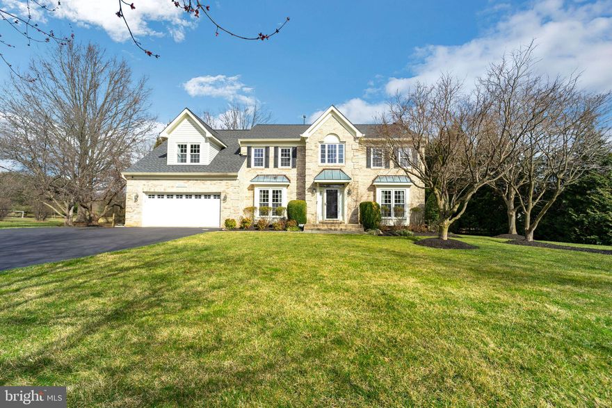 Welcome home to this 4 bedroom, 3.5 bathroom single family home with attached 2 -car garage (including 220v car-charging outlet) in the sought after Laytonsville Knolls neighborhood! This home is situated on a quiet, cul-de-sac street on a 1.3 acre lot and features a recently resealed driveway that offers over 4,300 finished square feet of space to make memories. Walk into a beautiful 2-story foyer with gleaming hardwood floors reflecting the ample natural light. To your right is the perfect room for an office space or home library and the formal dining room is to your left with wainscoting adding a touch of sophistication. Through the dining room you will walk into the chef’s kitchen - an absolute dream to cook in with stainless steel appliances, custom cabinetry, granite countertops, an oversized island with second prep sink, additional storage and casual seating space as well as a drink preparation/workstation with built-in, professional-grade beverage cooler. Make your way onto the expansive outdoor Trex deck to enjoy outdoor dining and entertaining with friends and family. The fully-fenced backyard boasts numerous mature trees, creating a serene and idyllic place to play and relax in the warmer weather months. As you walk down the custom flagstone walkway to the patio you will find another space to enjoy the incredible backyard - a perfect place for a fire pit! An outdoor storage shed is the solution for your lawn and gardening tools. Back inside the home you will find the spacious living room is adjacent to the kitchen and features a stunning gas fireplace with brick surround and a large bay window that fills the room with natural light. Retreat upstairs onto the second level of the home featuring new laminate flooring and walk into the luxurious primary bedroom suite with private sitting area, vaulted ceilings, enormous walk-in closet with custom built-in shelves, and a deluxe en-suite bathroom with jacuzzi tub, glass shower stall, and separate vanities. Three more spacious bedrooms - one with a walk-in closet, and two bedrooms with double closets - as well as a shared full bathroom in the hall complete this level of the home. On the lower level of the home you will find a fully-finished basement with laminate flooring and over 1300 sq ft of space to enjoy as a recreation room, additional family room, or whatever you may need! A full bathroom, home gym, and ample storage space is also on this level. Recent updates to the home include toilets in the master bathroom and main level half bathroom, fresh paint throughout the home (including the basement), light fixtures in the foyer and living room, gutters with GutterRX covers, A/C zone for the upper level of the home, and a Chamberlain garage door opener. You can’t beat the location of this home with close proximity to ICC, I-370, I-270 and 6 miles to Shady Grove Metro Station and four different golf courses (public and private). You are an easy drive into Olney, Laytonsville, and Rockville as well - don’t miss the opportunity to make this your home!