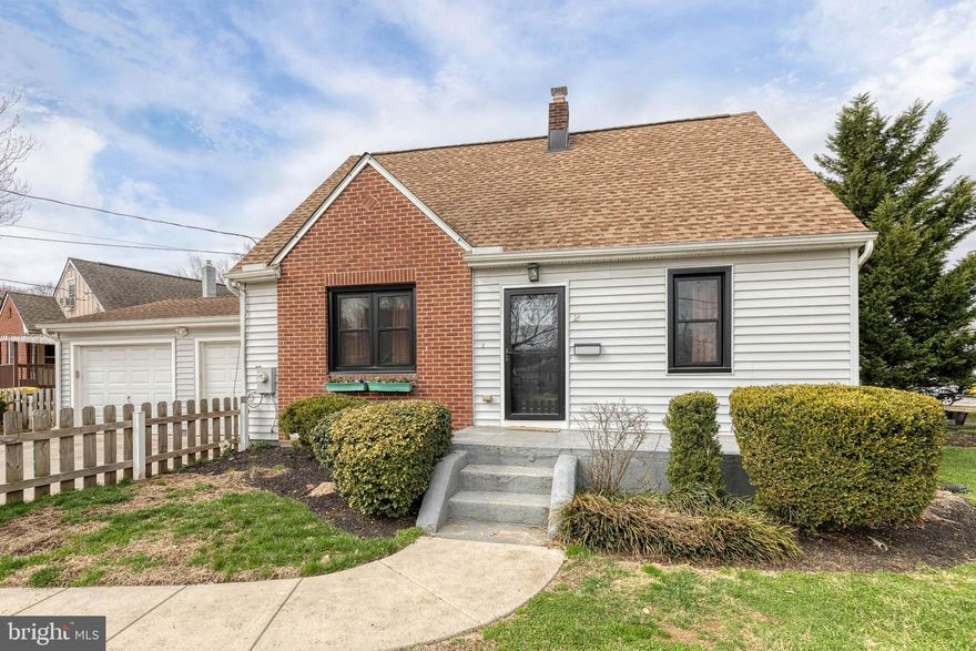 Charming 3 bedroom, 2 bathroom single-family home in Linthicum Heights featuring thoughtful updates throughout! Main level offers a bright living room with custom built-ins, separate dining room, and a stylish kitchen with stainless steel appliances, wood cabinetry, and a bold blue accent wall. Convenient main-level primary bedroom and updated full bath. Upstairs includes two spacious bedrooms with custom closet inserts and a beautifully renovated bath with glass walk-in shower and floating vanity. Finished basement with recessed lighting, rec room, bonus space ideal for office or gym, plus laundry and storage. Enjoy a large fenced yard and attached garage. Major updates include new windows, doors, gutter guards (2024), tankless water heater (2023), and lighting throughout!