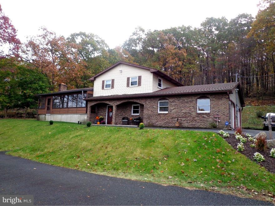 Enjoy the scenic views this remodeled 4 bedroom split-level in Yorkville has to offer. Resting on .9 acre wooded lot and terraced with an inground pool with a new motor and filter. Many upgrades since 2013 - all new flooring, all new windows and doors, new wood pellet stove, new HVAC and CENTRAL air system, new hot water heater, 2 new bathrooms. More amenities include Master Bedroom with full bath, 2 car side-entry garage, New kitchen with island and all appliances included, bonus sunroom off of kitchen for added entertaining space, brick wood burning fireplace in living room. There is space for everyone - take advantage on all the work being done!