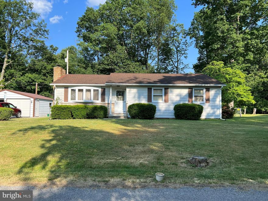 Very nice 3 bedroom 1 bathroom home just outside the Hancock town limits.  Open living, dining, and kitchen area, original hardwood flooring through living room, hallway, and all bedrooms.  Vinyl flooring in dining, kitchen, and bathroom.  Bathroom has updated walk-in bathtub.  Full basement which is partially finished and ready for your instant enjoyment.  Roof, water heater, and pressure tank are only approximately 7 years old with lots of life left.  Nice covered rear porch and fenced in rear lawn, paved driveway with a 2 car detached garage with electricity, and another shed for extra storage.  Property is located just about 3/4 of a mile from Hancock town limits and close to all the amenities Hancock has to offer.