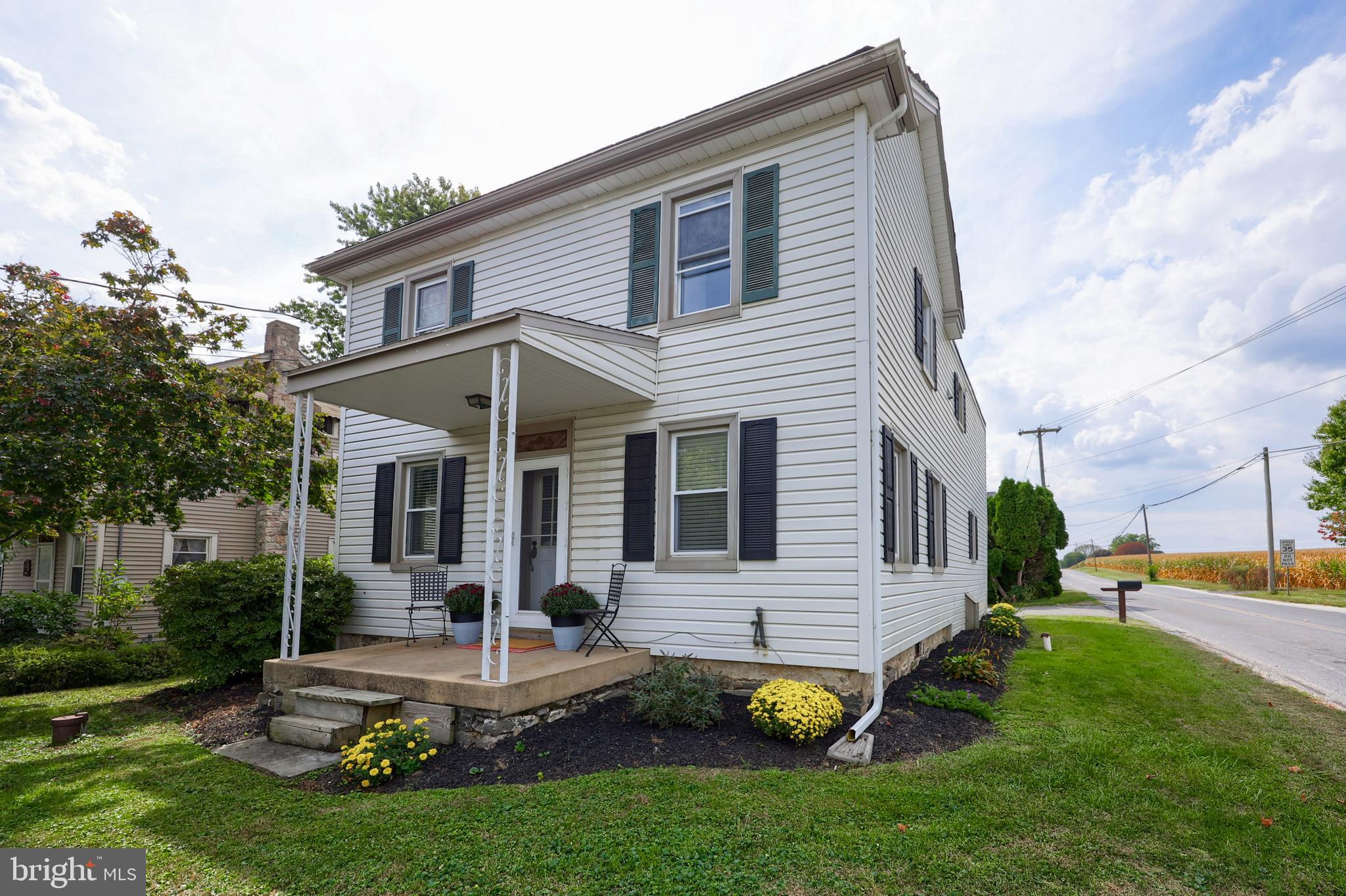 Charming Country Home on a Corner Lot with a 2 car detached garage.
Welcome to this classic two-story country home, perfectly situated on a corner lot with wide open views of Lancaster County farmland. This inviting property combines small-town charm with everyday convenience, offering the perfect setting for peaceful living.
Step inside to find a traditional floor plan with a cozy living space, a functional kitchen, and plenty of natural light streaming through the windows. Upstairs, you’ll find generously sized bedrooms that provide a comfortable retreat at the end of the day.
Outside, the welcoming front porch and well-kept landscaping create instant curb appeal, while the side yard offers space for gardening, outdoor dining, or simply enjoying the quiet countryside atmosphere.
Highlights include:
*Classic two-story design with timeless curb appeal
*Corner lot with open views and added privacy
*Welcoming front porch and mature landscaping
*Conveniently located near local shops, schools, and farmland scenery
This home is an excellent opportunity for anyone looking to enjoy the best of Lancaster County living in a home full of character and charm.