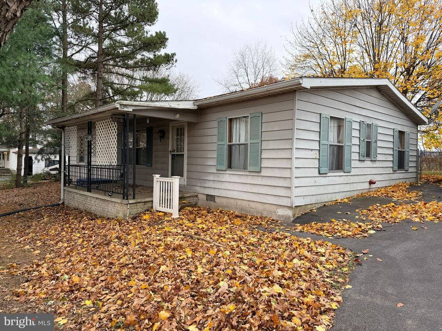 Ample space awaits you in Hagerstown! This open-concept double-wide home offers room to grow, with 3 large bedrooms and 2 large bathrooms. Step inside to a bright, open layout with a spacious living room that flows into a large kitchen complete with ample cabinetry and generous counter space. From there, you'll also find a separate dining room. Furnace replaced in 2024!  The rear yard aims to please with not one, but three detached garages, a shed, plus a gazebo. Easy access to shopping, dining, and commuter routes. Foundation is permanent, so the property eligible for standard financing options.