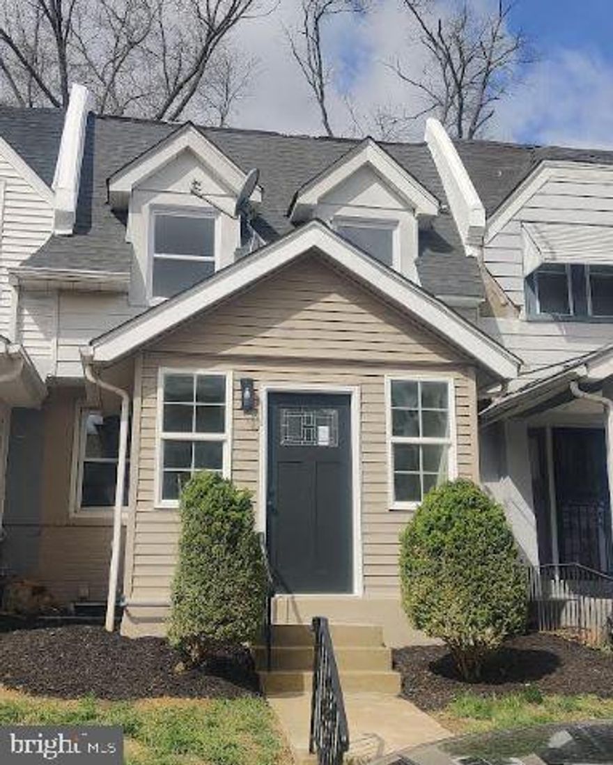 A must see! Beautiful Lansdowne Row Home on quiet non-thru street! Cute front yard leads to the enclosed front porch with a ceramic tile floor.  Enter the Formal Living Room with cozy fireplace, open concept  Dining Room and built in a/c. Totally renovated Modern Kitchen with a stainless steel appliances and soft close cabinets.  A great place to cook and an outside exit to a spacious New Deck! 2nd fl features the Master Bedroom w/ceiling fan and large closet, 2 additional bedrooms with ceiling fans and a updated bathroom with tile walls and floor. The Basement is a finished rec room with Front Loader laundry facilities and an access to additional Bedroom and 1/2 Bath.  New  Roof! Don't miss out on this adorable home!