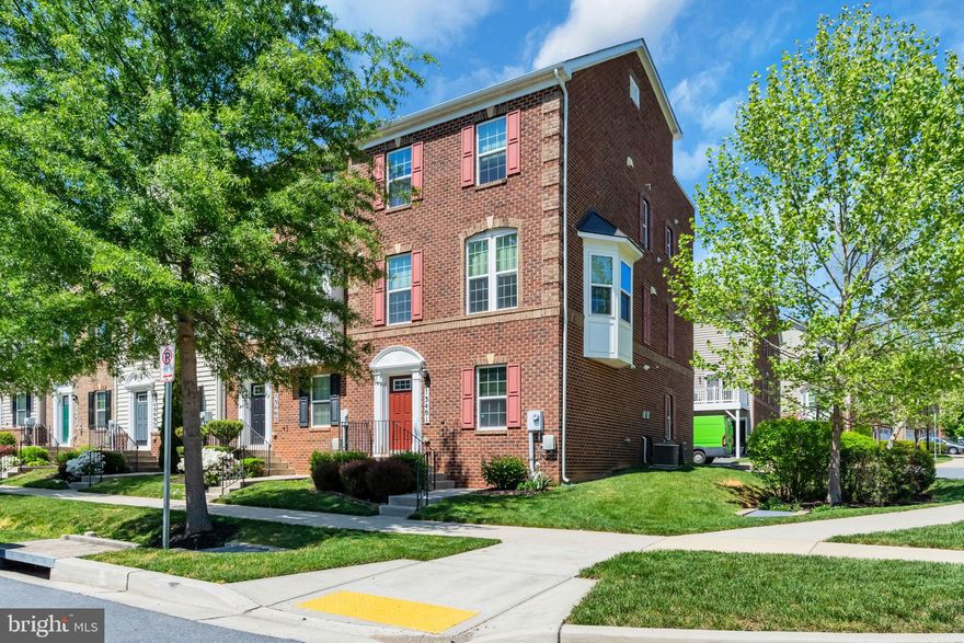 This spacious, sun-drenched end-unit townhouse offers an exceptional blend of comfort, style, and functionality across four fully above-ground levels. Featuring 5 bedrooms and 4.5 full bathrooms, the home is thoughtfully designed to maximize both space and natural light.  The main level boasts a bright open-concept floor plan, highlighted by a charming bay window that fills the space with sunshine. Fresh paint and elegant hardwood flooring extend throughout the main level and hallway, while the gourmet kitchen serves as the heart of the home—perfect for everyday living and entertaining. Step outside to the main-level patio, ideal for relaxing or enjoying outdoor dining.  Upstairs, the upper level includes three generously sized bedrooms and two full bathrooms. The top level offers a private bedroom suite with its own full bath, along with access to a spacious deck—perfect for unwinding or hosting guests. The lower level adds even more flexibility with an additional bedroom and full bathroom, ideal for guests or multi-generational living.  All bedrooms feature stylish and durable LVP flooring. As an end unit, the home enjoys extra windows and abundant natural sunlight throughout, creating a warm and inviting atmosphere.  Additional highlights include a two-car garage and a prime location close to shopping, dining, and convenient access to I-270, making commuting easy.  With its generous layout, desirable end-unit position, and sun-filled interiors, this home truly has it all.