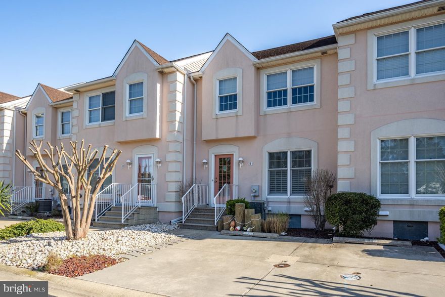 Welcome to your dream escape in the heart of North Ocean City! The Portofino Townhomes community stands out as a true gem, where breathtaking vistas and a vibrant waterfront lifestyle converge. This is not just a home; it's a lifestyle waiting for you. Imagine sipping your morning coffee in your all-season sunroom, where natural light pours in through expansive windows and skylights, offering stunning views of the community pool. This exceptional 3-bedroom, 2.5-bathroom townhome boasts a generous living space, perfect for entertaining family and friends or simply unwinding after a day at the beach. Step inside to find an inviting open-concept layout featuring a spacious living area and a modern kitchen adorned with brand new stainless steel appliances and exquisite quartz countertops. The stylish LVP and tile flooring throughout the main level enhances the home's sophistication & easy maintenance.This unit comes mostly furnished, making your move-in seamless and stress-free. With pride of ownership evident throughout, this townhome has never been rented, ensuring it’s been lovingly maintained and cared for. Enjoy leisurely strolls with your pets, watch children ride bikes, or take a quick dip in the community pool to cool off on a warm summer's day. And for the boating enthusiasts, your very own deeded boat slip (#3/10,000 lb lift) on the gated community pier awaits, complete with water and electric access.  Just a stone's throw from several popular restaurants and a  mile from Maryland and Delaware’s  beaches. Best of all, this community offers the incredible benefit of no city taxes, allowing you to enjoy more of what you love. Don’t miss out on this unique opportunity to live where you play! Schedule your private showing today and embrace the coastal lifestyle you deserve at Portofino Townhomes!