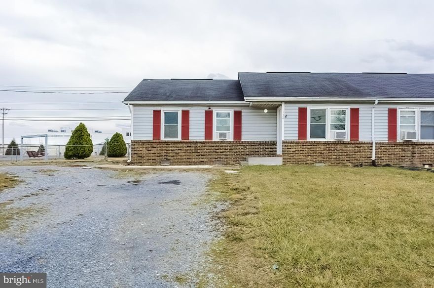 This beautiful duplex features 3 bedrooms and 1.5 baths with an extension on the back that could be used as a 4th bedroom or office. Home was just painted, and new floors put in and hardwood refinished. Home is located on a huge corner lot with great yard with large deck and fire pit. It has a circle driveway that can fit plenty of cars and is in a great location.